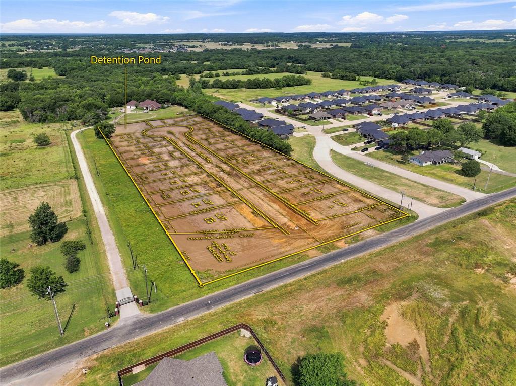 An exceptional opportunity for a builder or investor to acquire Pearce Meadows, a 25-lot residential development in Pottsboro with the groundwork already completed for the next phase: building homes. Located within the Pottsboro city limits, in Pottsboro ISD, near Hwys 120, 289 and just minutes from Lake Texoma, this development is positioned in one of North Texas' most desirable growth areas. The engineering, platting and required city approvals have been completed, eliminating much of the time, expense and uncertainty associated with taking a new subdivision from concept to construction. Pottsboro city water and sewer are already installed, with storm drainage, electricity and concrete streets scheduled for completion by September 2026. Build sites are anticipated to be ready for home construction in October-November 2026. Pearce Meadows offers a builder the opportunity to step into a substantially completed development and focus on what comes next—building and selling 25 new homes. With infrastructure nearing completion, proximity to Lake Texoma and convenient access to Hwy 120 and 289, this is a rare opportunity to acquire an entire residential project just before vertical construction begins.