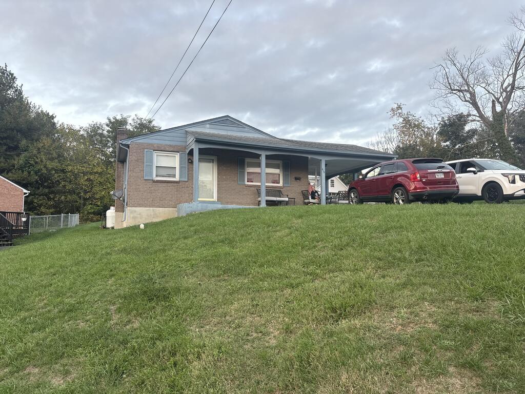 Bring your vision and make this well-built home your own! Located at 615 Fifth Street NE in Pulaski, this property offers 3 bedrooms, 2 bathrooms, and 5 rooms. While the home needs some updating, it offers solid construction and an opportunity for its next owner to add personal touches and make it their own. Additional features include an unfinished basement offering storage or workshop potential and an attached covered carport for convenient covered parking. Conveniently located near local shopping, grocery stores, restaurants, parks, and other community amenities in the Town of Pulaski. Whether you're looking for a home to personalize or an investment opportunity, come explore the possibilities this property has to offer!