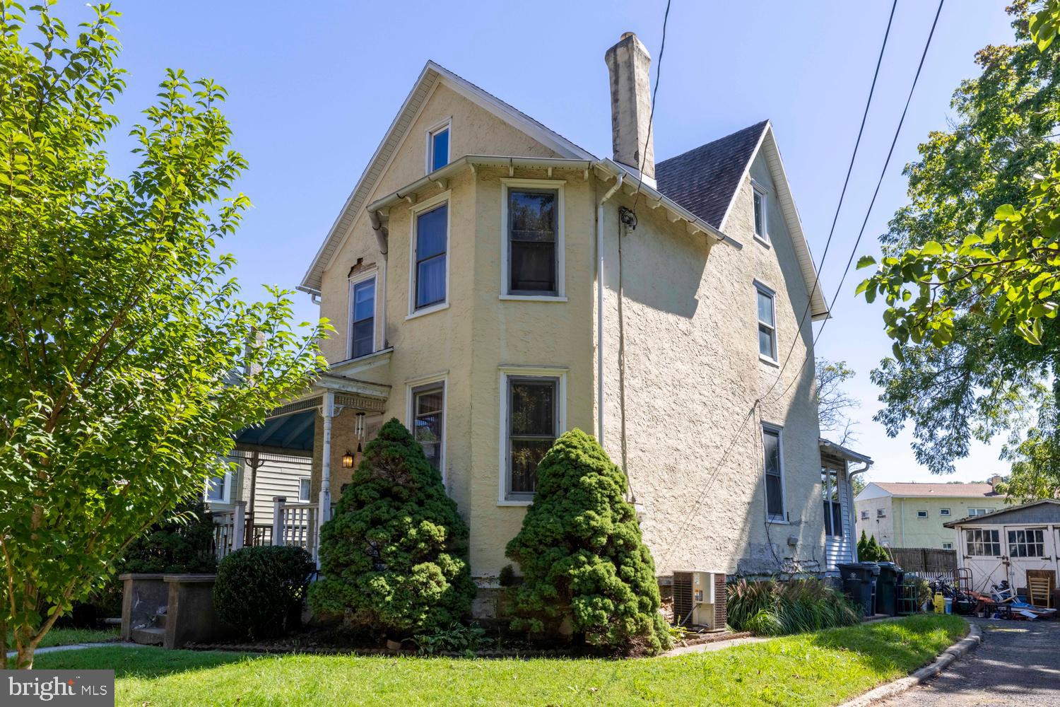 A once in a lifetime opportunity to own one of the original homes on the block, 127 Central Avenue is a Victorian single with a large yard in North Hills, Abington Township. First time on the market in close to 50 years. Built around 1900 and filled with character. Off street parking. With more than 2,100 square feet of living space, the home features hardwood floors, dining room built ins, a traditional laundry chute, a mud room, and a huge walk up attic. The first floor includes a front porch, foyer, living room, dining room, kitchen, family room, half bath, and a truly unique piece of design history: an original IKEA kitchen with stainless steel counters dating back to the company’s early years in the United States. Rear exit mudroom. Upstairs are four bedrooms and a full bath and large walk up attic for tons of storage and convenient access. The unfinished basement offers plenty of storage, while the large lot provides generous outdoor space. A detached garage with carriage house style doors adds even more charm. Concrete pad for storing larger items or vehicles. With its generous proportions, original details, and long history in the neighborhood, this is a distinctive property with character, space, and tremendous potential. Level lot. The home offers opportunities for upgrades and updates to its cosmetics and mechanical systems. Glenside post office and zip code, 19038. North Hills subdivision. Priced taking into consideration any possible updates, upgrades, or repairs.