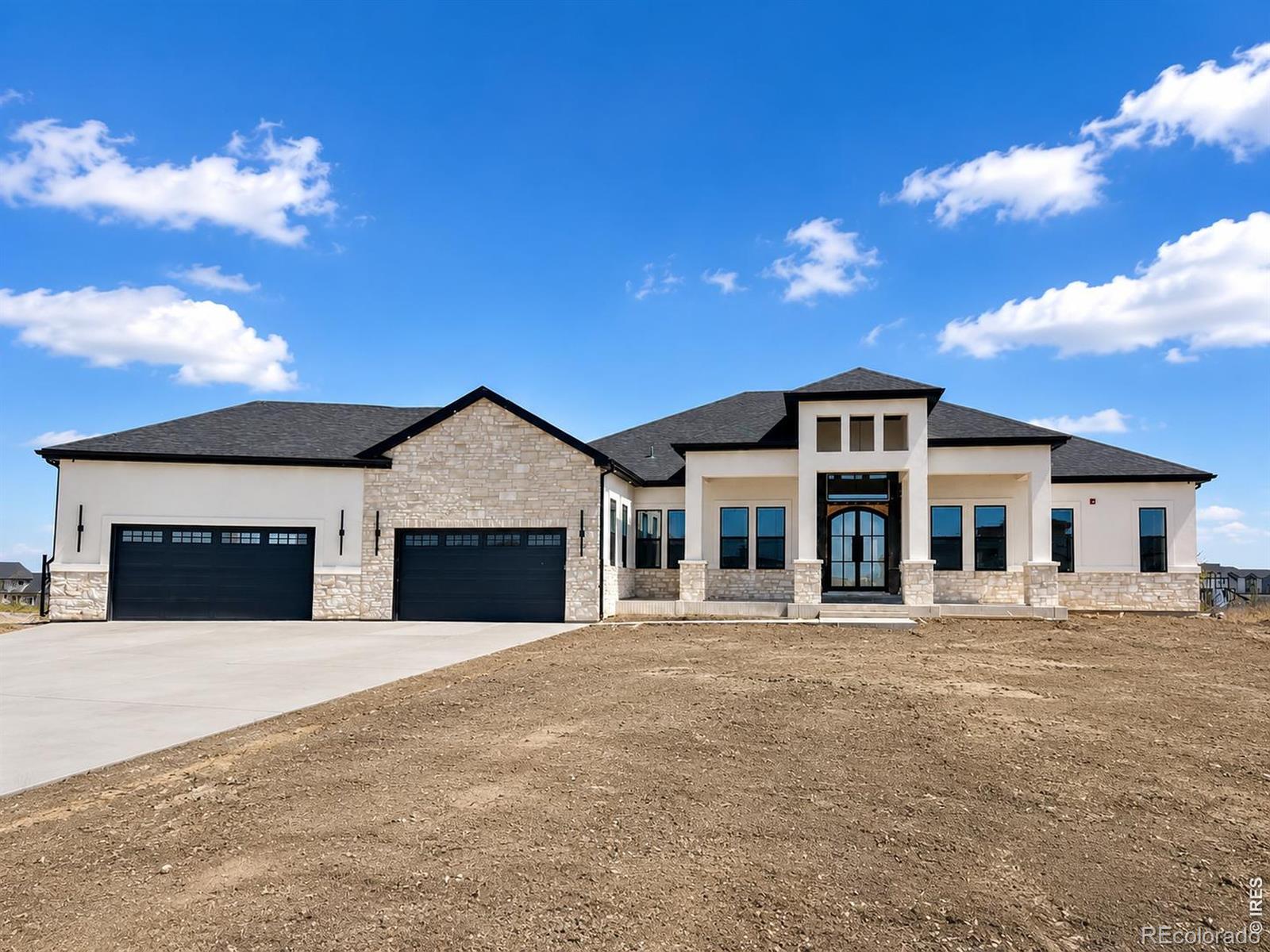 Luxury Living Meets Colorado Serenity. Welcome to an extraordinary custom ranch estate in the prestigious Country Club Ranchettes, where luxury, privacy & thoughtful design come together on a sprawling 2-acre lot. From the moment you step through the grand entry, you're greeted by soaring vaulted ceilings, a dramatic wall of windows & an abundance of natural light that fills every corner of the home. The expansive open-concept design was created for both elegant entertaining and comfortable everyday living. The chef's kitchen is a masterpiece of style & functionality, featuring a waterfall island, professional-grade gas range, walk-in pantry, butler's pantry, & abundant cabinetry. The great room is anchored by a floor-to-ceiling designer fireplace. The primary retreat offers a private sanctuary with its own fireplace, direct access to the covered deck, a spa-inspired five-piece bath featuring a freestanding soaking tub, oversized dual shower & an expansive walk-in closet. Each bedroom enjoys the comfort & privacy of its own en-suite bathroom.The fully finished lower level expands your living & entertaining possibilities with three additional bedrooms, a dedicated theater room, a spacious wet bar & a bonus room ideal for a home gym. Designed with entertaining in mind, the covered outdoor living area includes a convenient powder bath for guests, creating the perfect setting for summer gatherings, game-day celebrations, or relaxing evenings under the Colorado sky.Throughout the home, an integrated whole-house audio system allows you to enjoy your favorite music seamlessly. Nestled within the highly sought-after Country Club Ranchettes community, enjoying the rare combination of estate-sized homesites, peaceful surroundings & convenient access to Brighton, DIA, Denver, & major commuter routes. Experience the freedom of country living without sacrificing modern convenience.This is more than a home-it's a lifestyle defined by luxury, space, and timeless elegance.