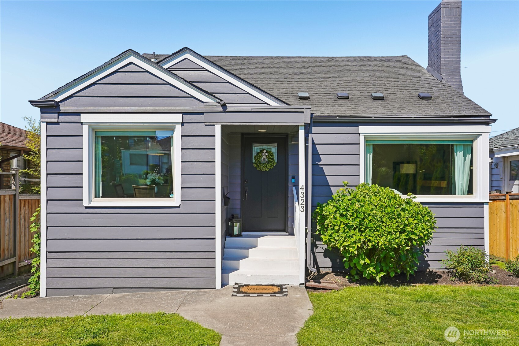 Welcome to this beautifully updated Beacon Hill home, blending classic charm with modern comfort. Featuring 4 bedrooms, 3 baths, & flexible living spaces. This move-in ready home offers brand-new carpet & fresh new exterior/interior paint. Spacious kitchen includes 1-yr-old stainless steel appliances, with double oven, abundant storage, and opens to cozy dining area. Stay comfortable year-round with mini-split heat & A/C and a versatile lower-level bedroom & bonus space. Outside, the home is fully fenced with a thoughtfully redesigned back yard, boasting additional green space and improved areas for entertaining, play, and relaxation. Enjoy the covered patio with an adjustable canopy that opens or closes to suit the occasion. Alley access, garage parking, and a convenient location near transit, parks, and Beacon Hill amenities complete the package.