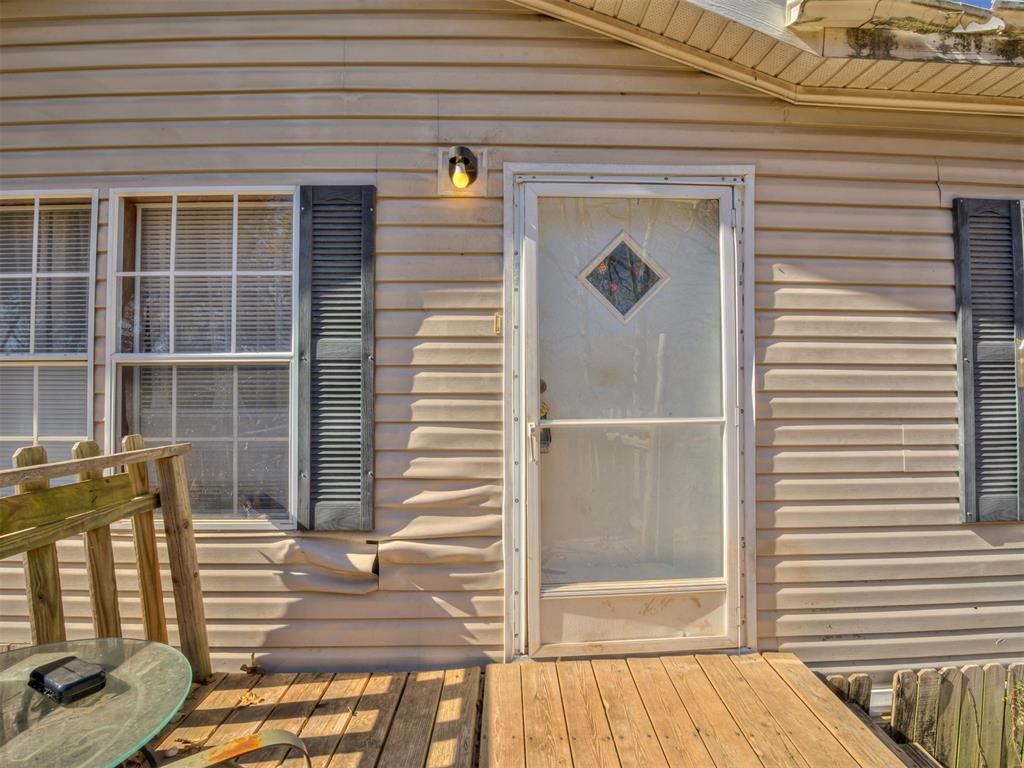 CASH-ONLY SALE!
Unlock the opportunity to own two peaceful acres of land offering endless room to expand, create, and dream. This generously sized property provides a rare blend of open space and natural surroundings—ideal for those seeking privacy, possibility, and a fresh canvas to build upon.

A functional home already sits on the land, giving you the unique ability to live comfortably while designing and constructing your dream home. Imagine mornings overlooking your own acreage, evenings under the open sky, and the freedom to shape your property into the retreat, estate, or hobby space you’ve always envisioned.

Whether you're building new, investing in land, or craving a little extra breathing room, this property provides the versatility and potential you’ve been searching for.