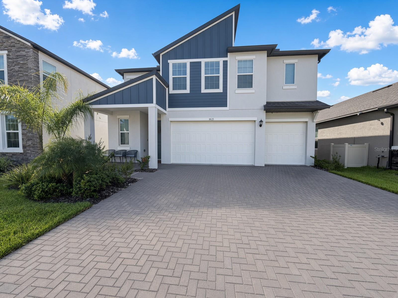 Virtually Staged. Stunning pond-View Home in Pearl Estates-Lutz, Florida. Discover the perfect blend of modern, elegance, comfort and Florida living in this exceptional two-story home in the desirable Pearl Estates community of Lutz! Built in 2025, this beautifully designed residence offers 5 bedrooms, 4.5 bathrooms, and approximately 3,273 square feet of thoughtfully crafted living space. From the moment you enter, you’ll appreciate the bright, open-concept layout, where spacious living areas flow effortlessly into one another. The chef-inspired kitchen is designed for both everyday meals and memorable gatherings, while the expansive family room provides a welcoming space to relax, connect, and entertain.Step outside to your covered lanai and take in serene pond views that create a peaceful backdrop for morning coffee, evening conversations, or weekend gatherings. The electric screen enclosure allows you to enjoy the outdoors comfortably throughout the seasons, adding even more versatility to this inviting retreat.A water softener provides an additional touch of comfort and convenience.The flexible floor plan is ideal for a variety of lifestyles, featuring a first-floor bedroom suite that offers privacy and convenience for guest or multigenerational living. Upstairs, additional bedrooms, a spacious loft, and a private suite create a comfortable and functional retreat for everyone.Located in Lutz with convenient access to shopping, dining, entertainment, and major roadways, this remarkable home offers the space, style, and setting you’ve been waiting for. Come experience the beauty of pond-view living and make this Pearl Estates gem your own.