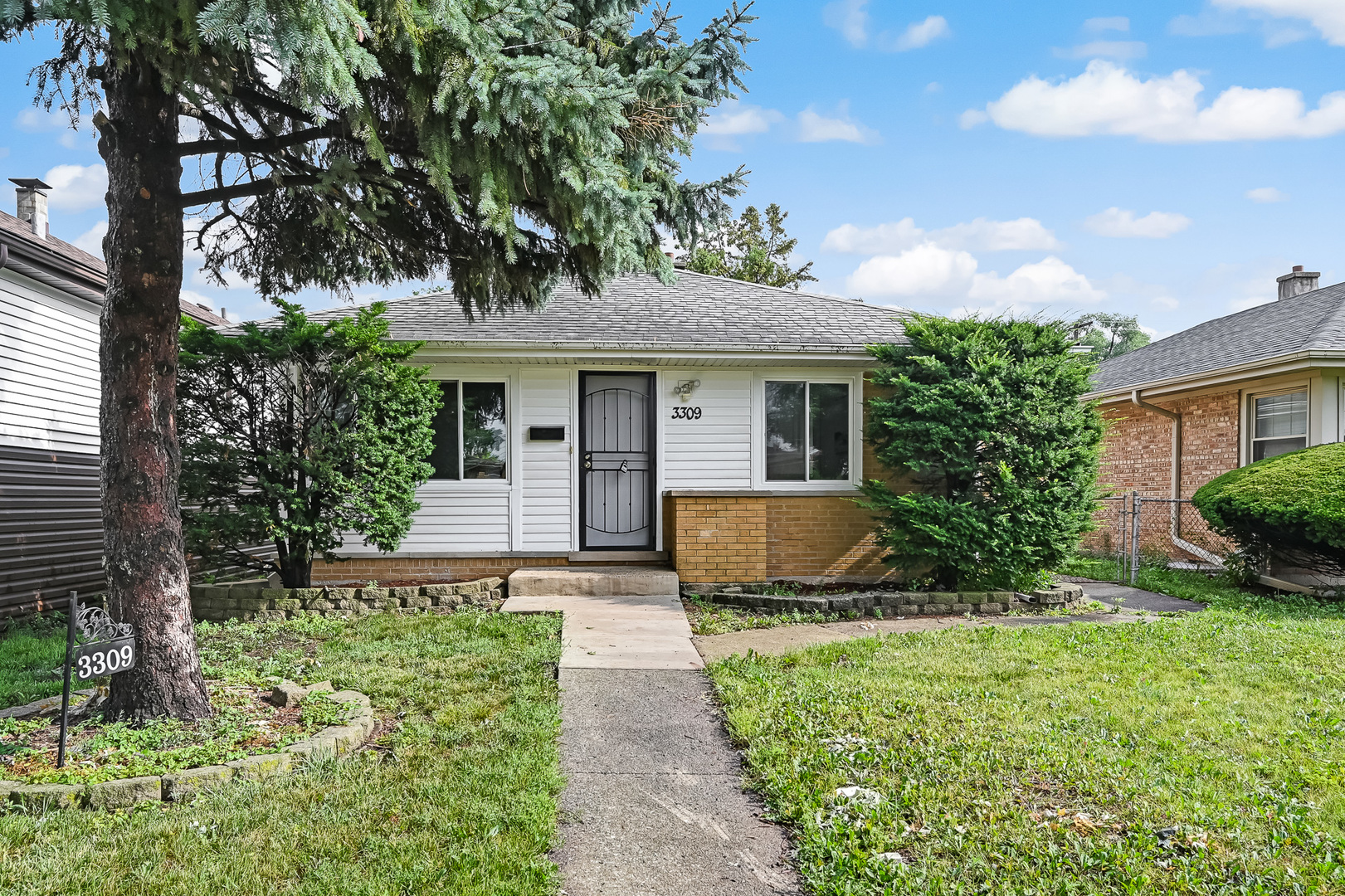 Discover this oversized brick ranch featuring a freshly painted interior and newly refinished hardwood floors. The main floor welcomes you with a lovely living room and dining room and an eat-in kitchen equipped with new flooring, stunning granite countertops, and stainless steel appliances. 3 bedrooms along with a full bathroom boasting new flooring and a newly tiled tub/shower surround complete the first floor. The fully finished basement includes a versatile recreation room, an office or 4th bedroom, and a second full bathroom with updated flooring. The property also includes a fenced backyard and a two-car garage, providing ample space and privacy. All in, an incredible value!
