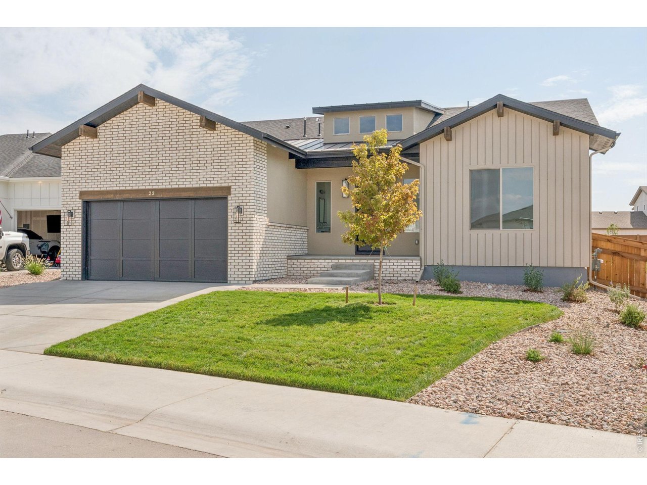 $15,000 Builder Incentive Available - Use It Your Way! Apply it toward an interest rate buydown, closing costs, or a price reduction. This custom-designed ranch-style home blends elevated finishes with a bright, open layout on a spacious 10,363 sq ft west-facing lot in Greenspire at Windsor Lake. At the heart of the home is a standout chef's kitchen with warm cabinetry, veined quartz countertops, black accents, and an oversized island designed for both everyday living and entertaining. Vaulted ceilings and expansive windows fill the main living spaces with natural light, while the great room is centered around a tiled fireplace that brings warmth and a strong focal point to the space. The private primary suite offers a spa-inspired bath with dual vanities, a freestanding soaking tub, and a walk-in shower. The finished basement adds flexibility with a large rec room, wet bar, two additional bedrooms, and a full bath, creating plenty of space for guests, entertaining, or everyday living. A covered patio extends the living space outdoors, while the spacious lot, complete with landscaping and fencing, offers a move-in ready experience inside and out. Located with easy access to Windsor Lake, downtown Windsor, and community events, this home brings together thoughtful design, everyday comfort, and one of Windsor's most loved neighborhoods.