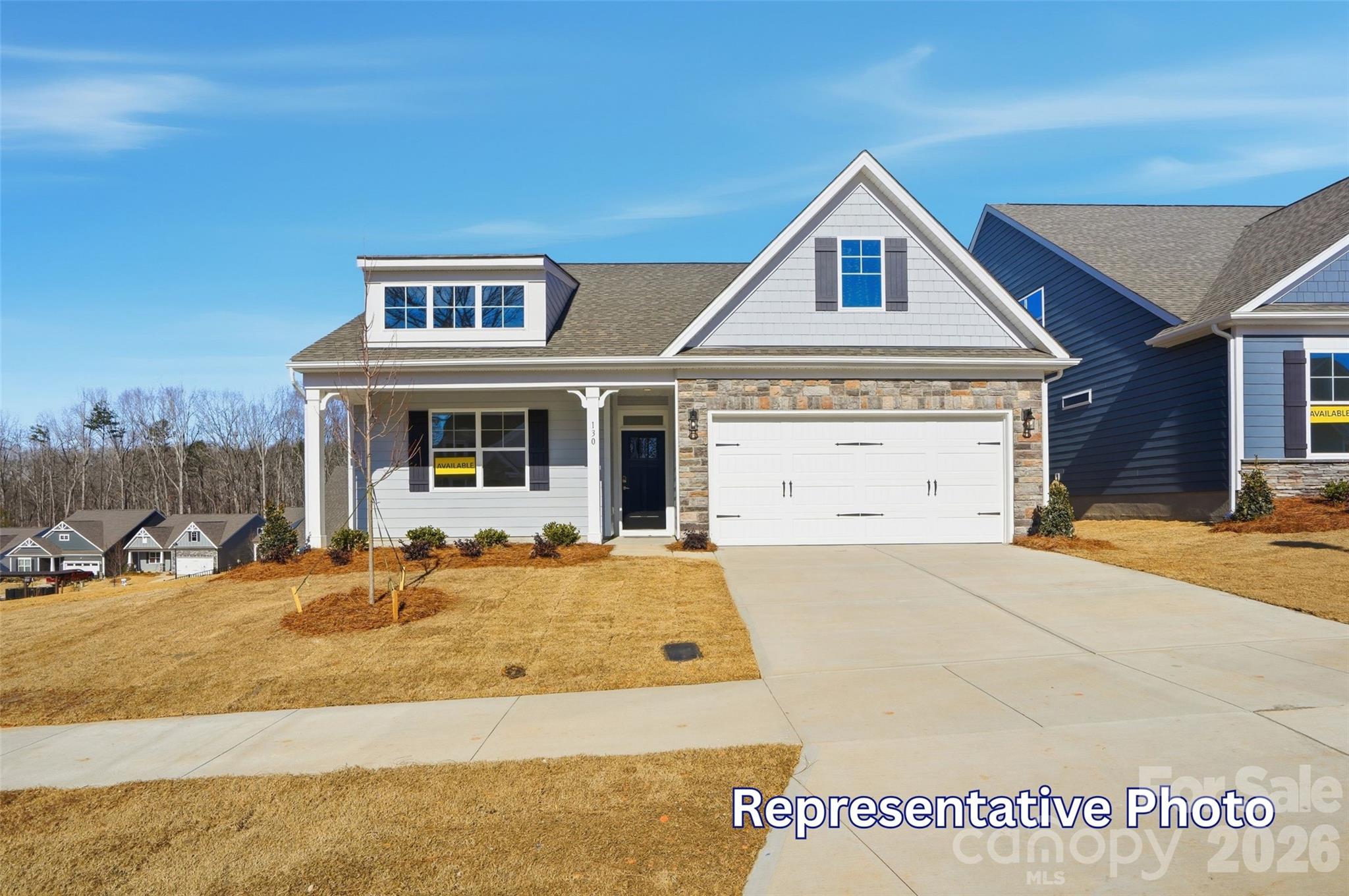 Welcome to Ashton Park, a brand-new community in Monroe! This 1.5-story Stanley plan offers 4 bedrooms, 3 full baths, a rear screened porch, and more than 2,100 square feet of living space. The primary suite is on the main and features a tiled, luxury shower with bench seat and semi-frameless door, two separate vanities, and a linen cabinet. The main level also features two additional bedrooms as well as an additional bathroom with a vanity with quartz countertops and a tub/shower combo. The designer kitchen features white colored cabinets with matte black hardware, quartz counters, tile backsplash, stainless appliances including a gas cooktop and wall oven and designer range hood. Other main floor extras include a gas fireplace with slate surround in the family room, a built-in drop zone in the mud room, and Enhanced Vinyl Plank flooring in the main living areas. The upper floor has a bedroom with two closets, a large loft, and a full bath. All bathrooms have white cabinets and white quartz counters. Community amenities to include walking trails and a dog park. Find out more today!
