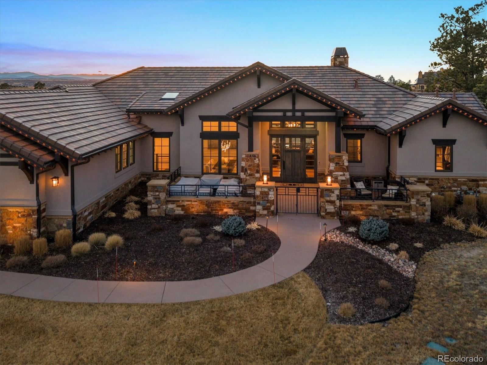 Set against the wide-open beauty of Colorado’s prairie landscape, this extraordinary patio home is where refined luxury meets effortless serenity. Perfectly positioned on 1.02 acres, the residence was thoughtfully designed to live as beautifully as it feels — blending elegant finishes with warm, inviting spaces that instantly feel like home.With 5 bedrooms, 7 bathrooms, and an attached 4-car garage, every detail reflects intentional design and elevated comfort. Sunlight pours through expansive windows, drawing your eye outward to breathtaking southwest-facing views of the Front Range, rolling prairie lands, and the home’s lushly landscaped grounds.Outdoor living becomes a daily escape. A private pool and hot tub create a resort-style setting, perfect for quiet mornings, sunset gatherings, or evenings under Colorado’s endless sky. Here, every season brings a new backdrop — from golden summer sunsets to peaceful snow-covered vistas.Located within the gates of the prestigious Colorado Golf Club, this Betts Lake patio home offers more than a residence — it offers a lifestyle. With 24/7 security, miles of walking trails, and abundant wildlife just beyond your doorstep, each day feels connected to nature while surrounded by one of Colorado’s most exclusive communities.https://listings.mediamaxphotography.com/7237-Prairie-Star-CtThis is Colorado living at its most beautiful — private, peaceful, and undeniably luxurious.
