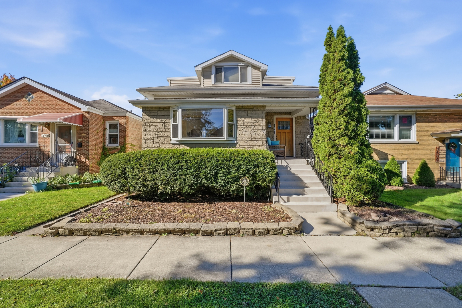 Incredible versatility and dual-purpose potential in prime Berwyn! Whether you are looking for a massive single-family residence with related living or a turnkey two-unit income generator, 3504 S Scoville Ave offers the ultimate flexible layout. The primary living space features a total of 4 bedrooms and 2 full bathrooms-with 3 generous bedrooms and 1 full bath on the main floor, plus a partially finished basement complete with a 4th bedroom, 2nd full bath, and plenty of extra storage space. Through a shared front vestibule with private interior entrances, the second floor opens to an expansive ~800 sq ft open-concept loft studio-ideal as a high-end rental unit, executive suite, or secondary living space. Equipped with separate electric meters and dual electric panels. Move right in, rent out immediately, or add cosmetic updates to build instant equity. Perfect for house-hackers, multi-generational families, or savvy investors!