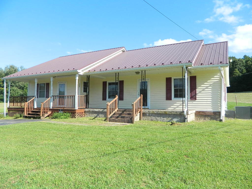 Country Living at its best! This spacious 3 BR, 2 BA home features separate living, family and sun rooms for comfort and personal space.  A large laundry/utility area with space for a freezer and storage. Lots on storage and built-ins throughout. A heat pump with propane back-up and an efficient oil-burning stove provide adequate heat during the winter months, and central cooling for the summer months. Children can attend schools in Marion, Chilhowie, & Sugar Grove. This property has a new survey showing .82 acres of land and is a division of the tax map stated. Two paved driveways. Has a storage room on second level. Located in a scenic area with mountain views and open fields all around. A large front covered porch for evening relaxing! This property also has several multi-purpose outbuildings. The work has been done, just come and reap the benefits! Schedule your viewing today!