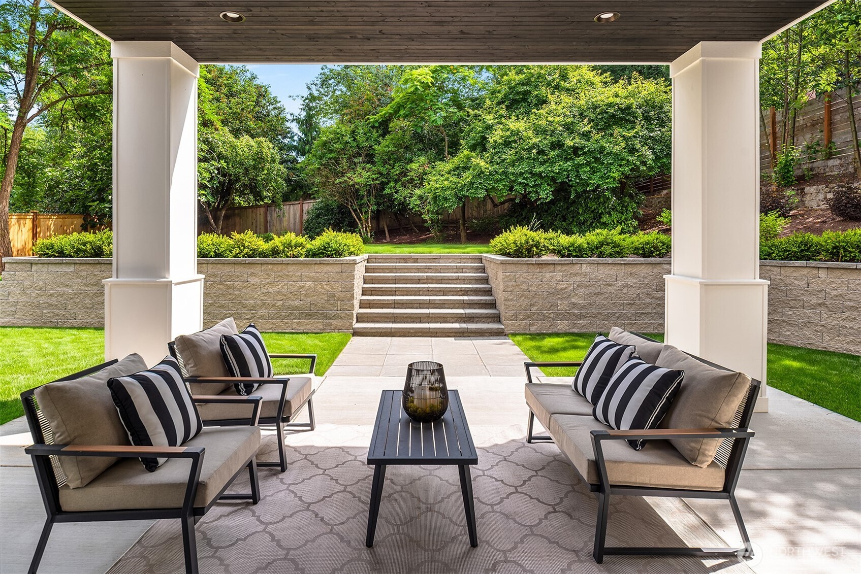 Covered back patio with outdoor lounge seating