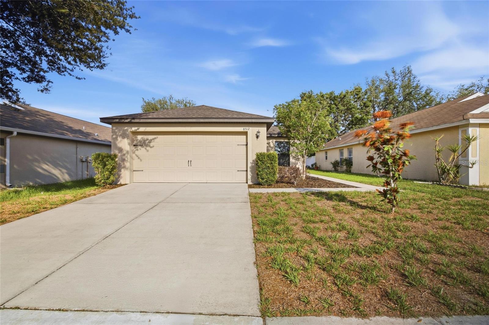 One or more photo(s) has been virtually staged. Welcome to this beautifully maintained 3 bedroom, 2 bathroom home offering 1,676 square feet of thoughtfully designed living space in Brooksville. Built with an open concept layout and modern finishes throughout, this property combines comfortable everyday living with functional entertaining space inside and out. Step inside to a spacious living and dining area filled with natural light and neutral finishes that create a bright, airy feel throughout the home. The open floor plan seamlessly connects the main living spaces, making it ideal for gatherings or relaxing evenings at home. The kitchen features granite countertops, dark wood cabinetry, stainless steel appliances, recessed lighting, a large breakfast bar, and abundant cabinet and counter space. Positioned at the center of the home, the kitchen overlooks the living and dining areas for easy entertaining and everyday convenience. The private primary suite offers a spacious bedroom, large walk-in closet, and ensuite bathroom with dual vanities and a walk-in shower. The split bedroom floor plan provides privacy from the two secondary bedrooms, which are generously sized and share a full guest bathroom. Sliding glass doors lead to a covered rear patio overlooking the oversized backyard with no immediate rear neighbors, creating the perfect setting for outdoor dining, entertaining, or simply enjoying the peaceful surroundings. Additional features include a 2-car garage, indoor laundry room, modern fixtures, energy-efficient construction, and ample storage throughout. Conveniently located near shopping, dining, schools, parks, and major roadways, this move-in ready Brooksville home offers the perfect blend of space, comfort, and functionality.