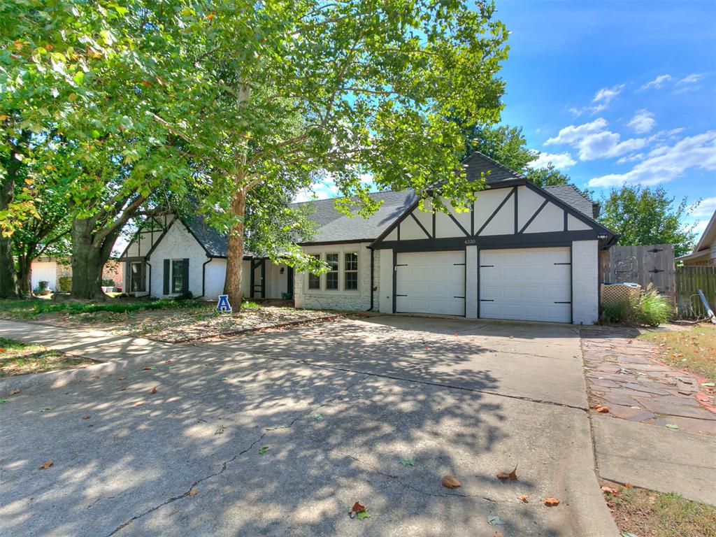 *VERY MOTIVATED SELLERS!* Welcome to Brookhaven in West Norman—where timeless charm meets thoughtful updates and plenty of room to live, gather, and grow. This 2,776 sq. ft. home sits beneath a canopy of mature trees, giving it that classic, inviting curb appeal from the moment you arrive. Step inside to rich wood floors that flow from the entry into the formal dining room and through the main living spaces. The living room feels warm and welcoming with its cathedral ceilings and stained wood beams that add both character and a sense of comfort. The updated kitchen is a true standout, featuring modern white cabinetry, black hardware, stainless steel appliances, and a beautiful butcher block countertop. Brick-look tile in the kitchen and high-traffic areas offers the perfect blend of durability and style, while the open layout keeps everyone connected. The primary suite is your own private retreat. Floor-to-ceiling built-ins offer incredible storage without the need for bulky furniture, and a sliding barn door leads to the spa-like bathroom where style and function come together effortlessly. Outside, the backyard is made for both relaxation and fun. A spacious wood deck is ideal for grilling or gathering with friends, and the sparkling inground pool—with a slide and cover—promises endless summer memories. A storage shed offers room for tools or hobbies, and the above-ground storm shelter in the garage provides peace of mind during Oklahoma weather. With four bedrooms, two and a half bathrooms, and thoughtful spaces designed for everyday living and easy entertaining, this home is ready for its next chapter. Whether it’s quiet evenings under the trees, weekends by the pool, or cozy nights in your own living room, this Brookhaven beauty has a way of making you feel right at home.