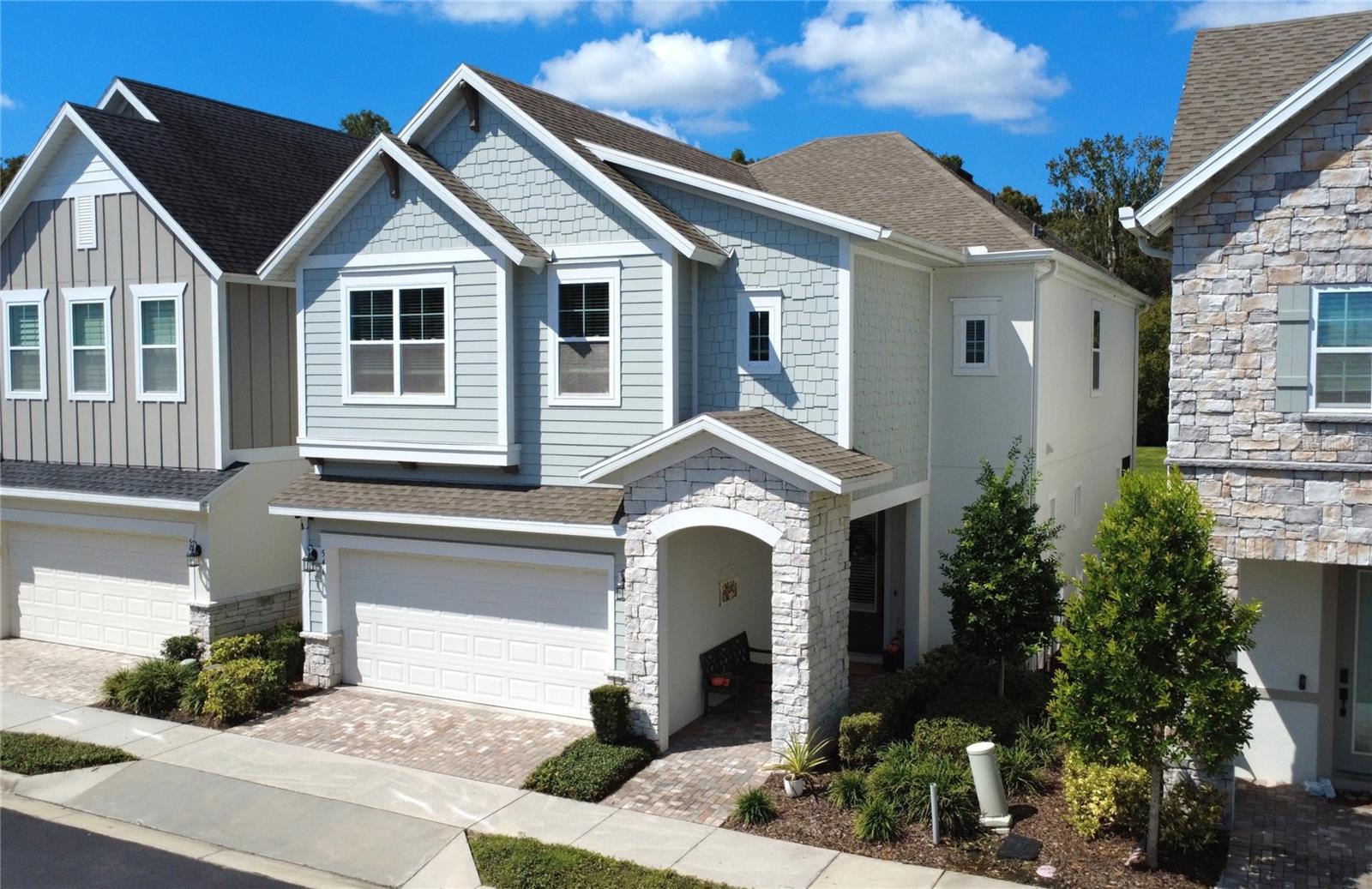 Under contract-accepting backup offers. Your dream home awaits in Griffin Park, a premier gated community in the heart of Lake Mary! This exquisite 3-bedroom, 2.5-bathroom waterfront residence boasts a spacious, open floor plan with breathtaking water and conservation views from nearly every room. With over $100K in builder upgrades, this home is truly move-in ready. As you step inside, you’ll be captivated by the expansive great room, featuring a gourmet kitchen with double-stacked cabinetry, gorgeous quartz countertops, top-tier stainless steel appliances, and a natural gas stove – perfect for those who love to entertain. The first floor also includes a convenient half bath, a mudroom off the attached garage with built-in storage, and sliding doors that open to a private covered patio and extended paver deck, complete with an electric awning and roll-down screen. Upstairs, a spacious bonus room offers versatility, ideal for a playroom, home office, gym, or second living room. The primary suite, along with the guest rooms and laundry room, are also located on the second floor. The master suite is a serene retreat with stunning water and conservation views, a cozy sitting area, and an indulgent ensuite with dual sinks, a jetted tub, a large seamless glass shower with a rainfall showerhead, and a custom walk-in closet. Throughout the home, you'll find engineered wood flooring (except in the guest rooms and baths), crown molding, and upgraded designer light fixtures. Griffin Park offers an array of exceptional amenities, including a resort-style pool and cabana, a spacious dog park, and the inviting Legacy Lawn fire-pit area, complete with a relaxing patio and lounge seating – the perfect place to unwind. The HOA covers lawn care, adding to the ease of living. This residence offers easy access to Griffin Farm at Midtown shopping complex which includes a gym, grocery store, and several restaurants all within walking distance. Ideally located near top-rated Seminole County schools and with easy access to I-4, SR 46, SR 429, and SR 417, you’re just a short drive from downtown Orlando and the beautiful beaches along Florida’s Atlantic coast. Call today for a private showing of this exceptional home!