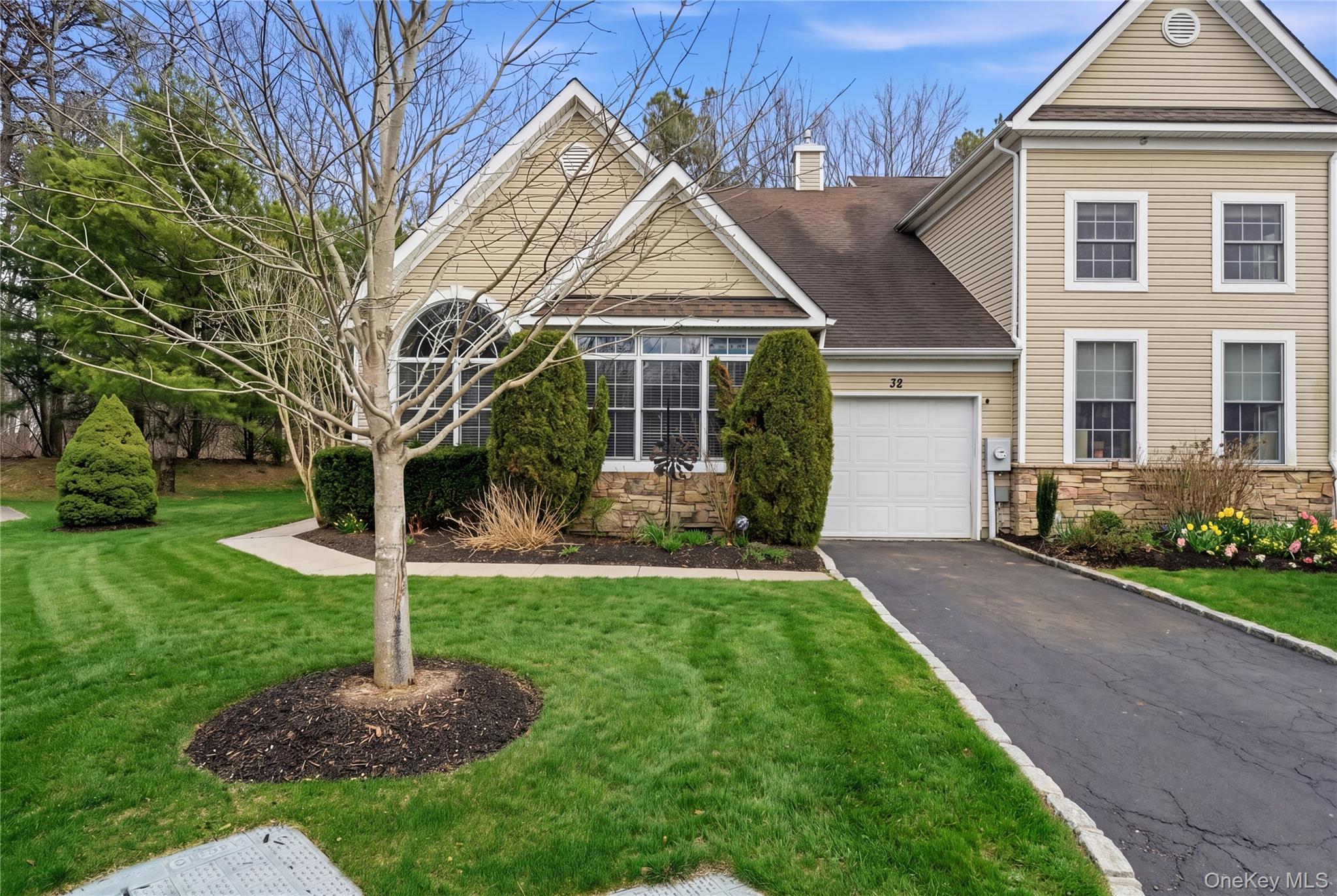 Beautiful 3 bedroom, 2.5 bathroom townhouse located at 32 Eagle Circle, offered at $688,888.00. Situated in The Preserve, a private gated community in Bohemia, this highly desirable Audubon model is a rare find.Built in 2006 and meticulously maintained, this spacious home offers approximately 1,999 square feet of living space. The layout features a first floor primary bedroom suite, providing both comfort and convenience.As a corner unit, the home includes a one car garage, central air conditioning, and gas heating and cooking. The open floor plan is enhanced by vaulted ceilings, creating a bright and airy feel throughout. The kitchen is equipped with granite countertops and stainless steel appliances and flows seamlessly into the living and dining areas. Additional highlights include a loft and a den, offering flexible living space.Residents enjoy access to a community pool and a peaceful setting adjacent to Connetquot State Park and nearby bike paths, making this an ideal location for both relaxation and outdoor activities.