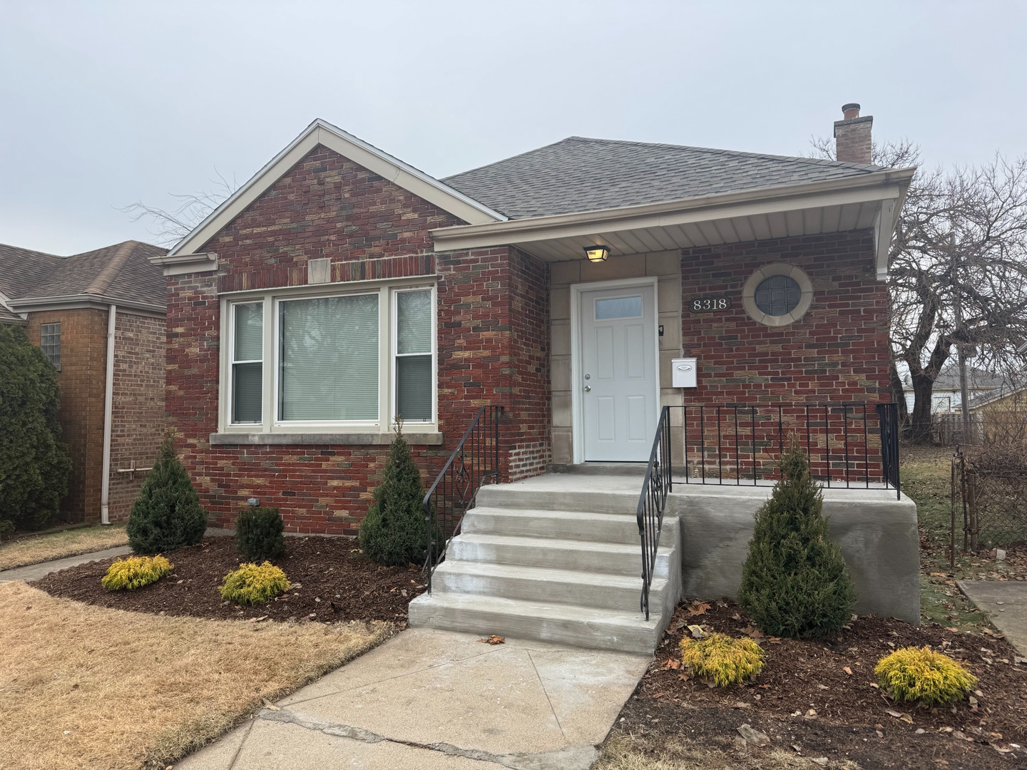 Newly Rehabbed 5 Bedroom 2.5 Bath Brick Ranch is the perfect turn-key home! The home is new from the inside out.  The interior has rich brown hardwood floors throughout the open concept layout.  Tons of natural light. An Eat-In Kitchen with side bar cocuntertop seating.  New stainless steel appliances, granite countertops, new cabinetry, lighting and backsplash.  There are 3 nice size bedrooms on the main floor and 2 located in the basement.  The main floor has a full bathroom as well as a half bath for guest.  Aside from the 2 bedrooms, the basement has a large family room for entertaining or movie night, an additional den area and another full bath with walk-in shower.   There is a laundry room as well. Step outside the basement onto a new back porch that leads to a nice size yard and the 2 car garage.  This home is a must see and easy to show! Schedule your appointment today.