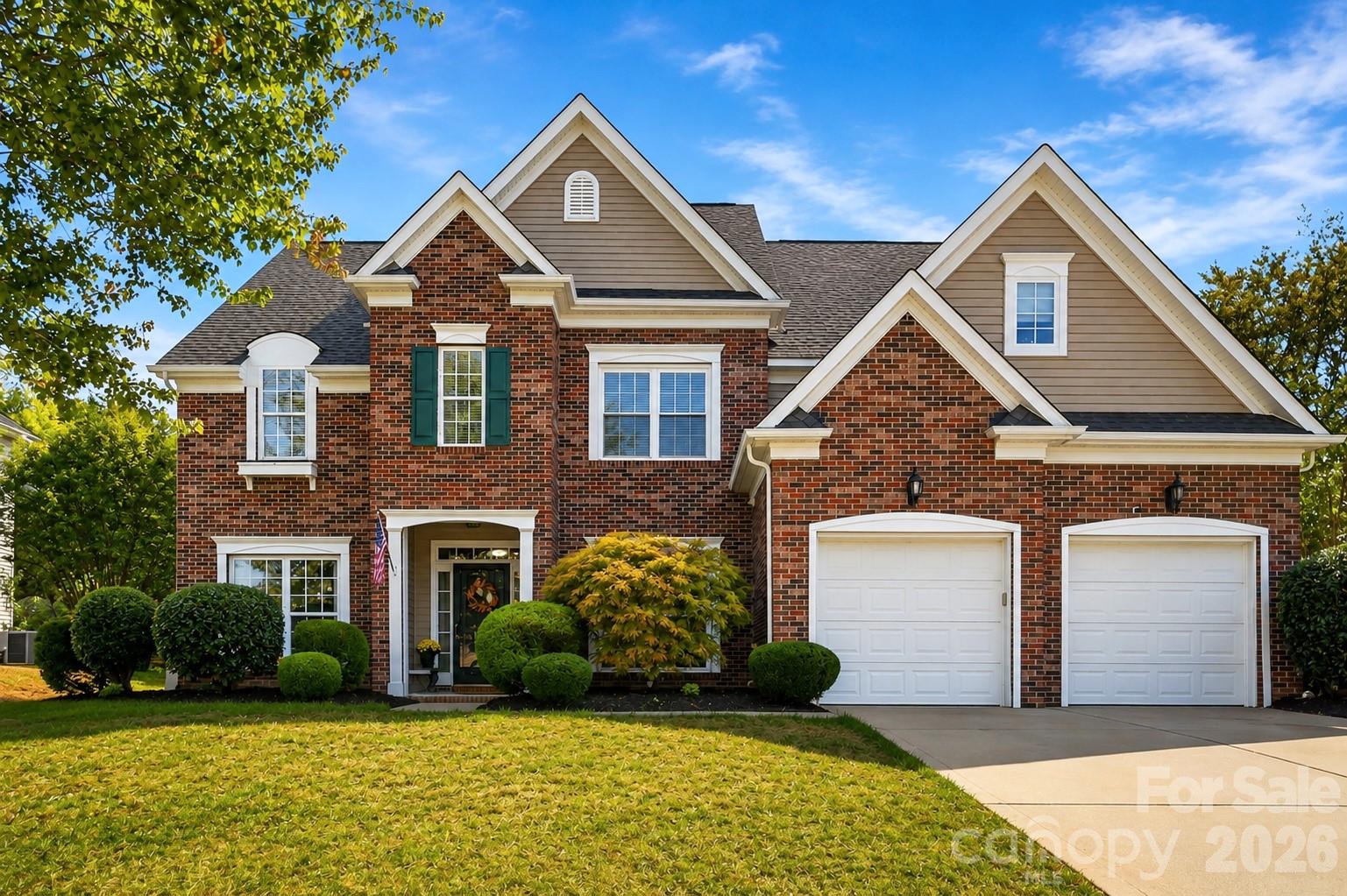 WOW! Luxury Living in the Highly Desirable Estate Section of Brandon Oaks! This stunning home offers timeless elegance, impressive architectural details, and thoughtful upgrades throughout. Located in the sought-after Estate section, known for larger lots, full-brick-front homes, and distinctive craftsmanship, this home makes an unforgettable first impression.Step inside to discover rich wood floors, tasteful architectural arches, elegant crown molding, and beautiful millwork. The thoughtfully designed floor plan offers formal entertaining spaces and an inviting open-concept layout. The elegant dining room features a butlers' bar and French doors leading into the kitchen and living area, perfect for entertaining.The Chef's Dream Kitchen features abundant cabinetry, quartz countertops, a large center island, tile backsplash, and a convenient corner pantry. The spacious breakfast area flows seamlessly into the breathtaking two-story great room, complete with a fireplace and custom built-ins.A main-floor bedroom and full bathroom offer flexibility for guests or multigenerational living, while an additional versatile living space is ideal for a private office, study, or flex room.Retreat upstairs to the spacious, sun-filled primary suite. The luxurious primary bathroom features a relaxing corner garden tub, separate shower, private water closet, dual sink areas, and two generous closets. Two additional spacious bedrooms and a full bathroom complete the upper level, with one bedroom offering direct bathroom access. A bright linen closet adds a charming touch as natural light filters through the window into the bathroom.The rear staircase leads to the sunken bonus room, currently set up as an incredible billiards and game room with a corner bar, darts, and plenty of space for entertaining. Imagine a media room, home gym, private office, study, or potential fifth bedroom—the possibilities are endless!Step outside to your own backyard oasis! The fully fenced backyard features a covered porch, extended patio, spacious grassy area, mature trees, and a dedicated fire pit area, perfect for relaxing evenings and entertaining. A storage building provides additional convenience, while a hidden gate and path behind the shed offer quick access to the community amenities.Resort-Style Living Awaits in Brandon Oaks! Enjoy two swimming pools, including a large lap pool and a resort-style pool with waterslide, covered picnic areas, a clubhouse, playground, scenic walking trails, lakes, and basketball, volleyball, tennis, and pickleball courts. Year-round social events create wonderful opportunities to connect with neighbors and enjoy this vibrant community.Ideally located near Sun Valley, with convenient access to shopping, dining, and entertainment, this home combines an exceptional location with an incredible lifestyle.A truly special home offering timeless elegance, flexible living spaces, an incredible backyard oasis, and resort-style amenities. Space, location, lifestyle, and summer-ready fun—this home truly has it all!