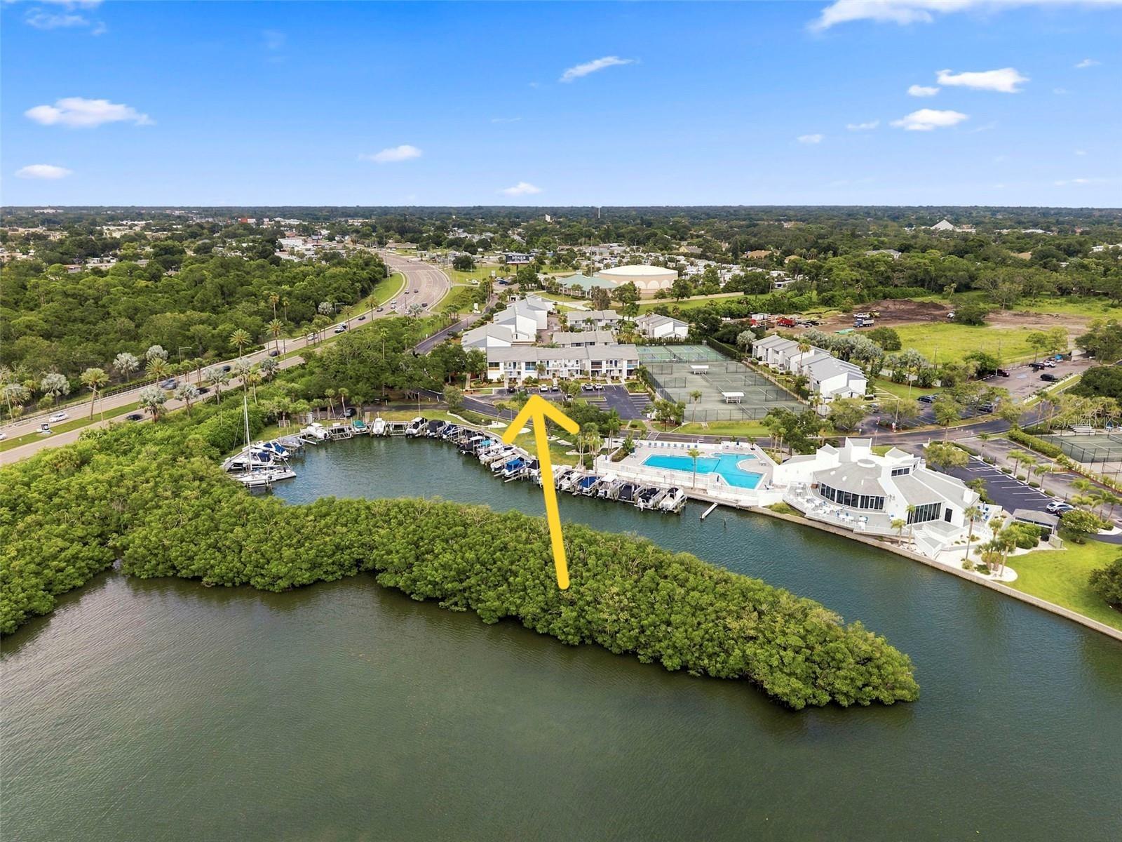 Completely updated 2bed 2bath, 1st floor condo with an open floor plan, seconds from Indian Rocks Beach, located on the intercoastal in a vibrant active community and NO age restrictions!  One month minimum rental period, and you can rent it right away after purchasing!!  Unit 702 at Indian Springs Colony is the perfect place to enjoy beach life living, while enjoying the 50+ acre resort like setting running along the intercoastal waterway, featuring a gorgeous water-front pool, tennis and pickleball courts, walking path, grilling area, a clubhouse which features a pub, pool table, library, meeting rooms and waterfront patio with tables and chairs.   Unit 702 is beautiful, featuring: tankless hot water system, spacious kitchen with high end appliances, granite countertops, high-impact hurricane windows and doors, automatic hurricane shutters, fully updated bathrooms, washer and dryer in the unit and a spacious balcony to sit, relax and enjoy the sunsets, over the marina, every evening.  This unit is in perfect shape and move-in ready!  1 assigned parking space right outside your door and plenty of guest parking.  A short stroll over the bridge is the best beach around for food and entertainment, Indian Rocks Beach, everyone's favorite beach town on the Gulf!  If your plan is for an active Florida lifestyle, then this is a great opportunity for you.  Close to all the beaches, golf courses, scores of restaurants, beach sunsets, malls, shopping, pubs, parks, grocery, entertainment, hospitals, clinics, professional baseball, playhouses, concerts, and 2 airports.   Great location, great price, great condition, and a great lifestyle in a well-managed condo community.   This unit is worth taking a look!