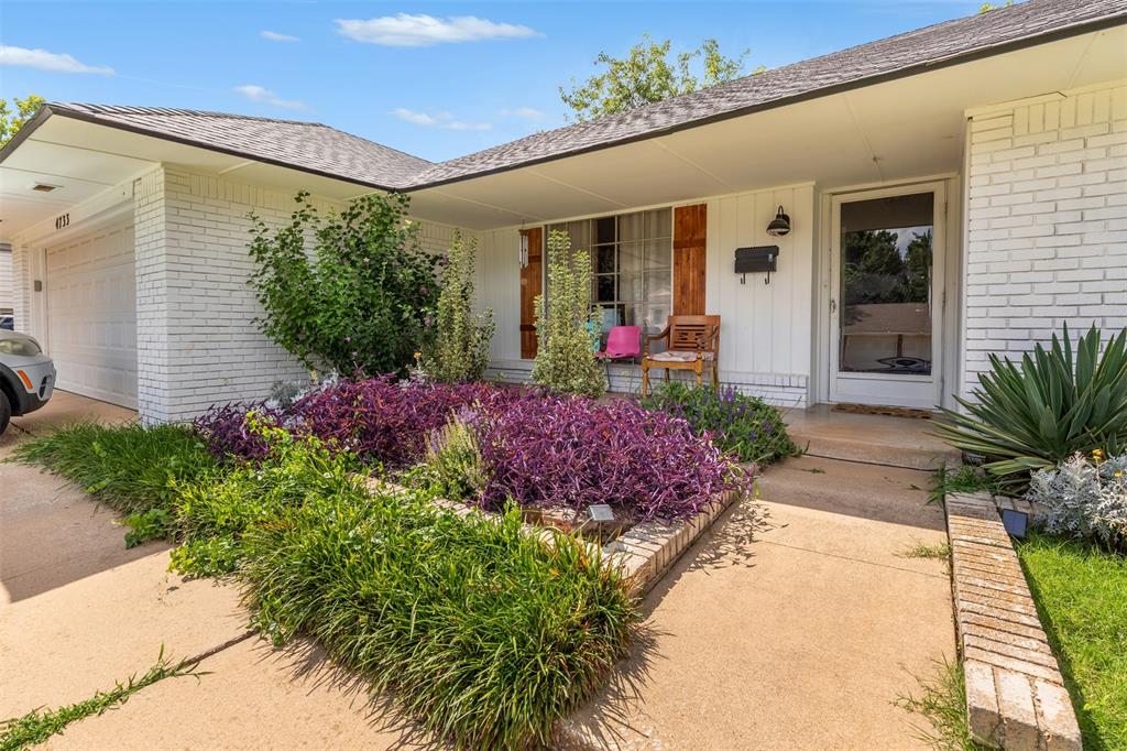 Welcome to this charming, beautifully updated mid-century home located just minutes from I-44 and Northwest Expressway, offering quick access to shopping, dining, and major thoroughfares. This home seamlessly blends vintage charm with modern updates and functionality. Step inside to discover the main living room featuring a wood-burning fireplace and a secondary living space offering the perfect setting for a home office but flexible to meet your personal or professional needs. The dining area is both functional and charming, complete with built-in cabinetry perfect for storage, displaying collectibles, or adding a touch of vintage flair. The converted garage adds even more versatility—fully heated and cooled, this flex space can serve as an additional living room, studio, game room, or home office. Prefer a garage? It can easily be converted back to a full 2-car garage with minimal effort. The home sits on a generous lot with a fantastic backyard—ideal for gatherings or gardening. Whether you're enjoying the character or the convenience of modern touches, this home offers the best of both worlds. Don't miss your opportunity to own a one-of-a-kind property in a prime location!