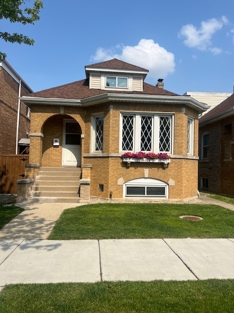 Check out this well maintained Chicago Bungalow features include new hardwood flooring, 2 full baths, kitchen has been redone with new countertops, second floor is huge bedroom with closets also a finished basement with bedroom and lots of closets    in-law kitchen semi done, new furnace, electric, all water pipes brand new ,Roof is 3 years old plus a  large deck and patio off of garage perfect for backyard get togethers. Garage has new party door and new Big door!! Make your appointment today!!