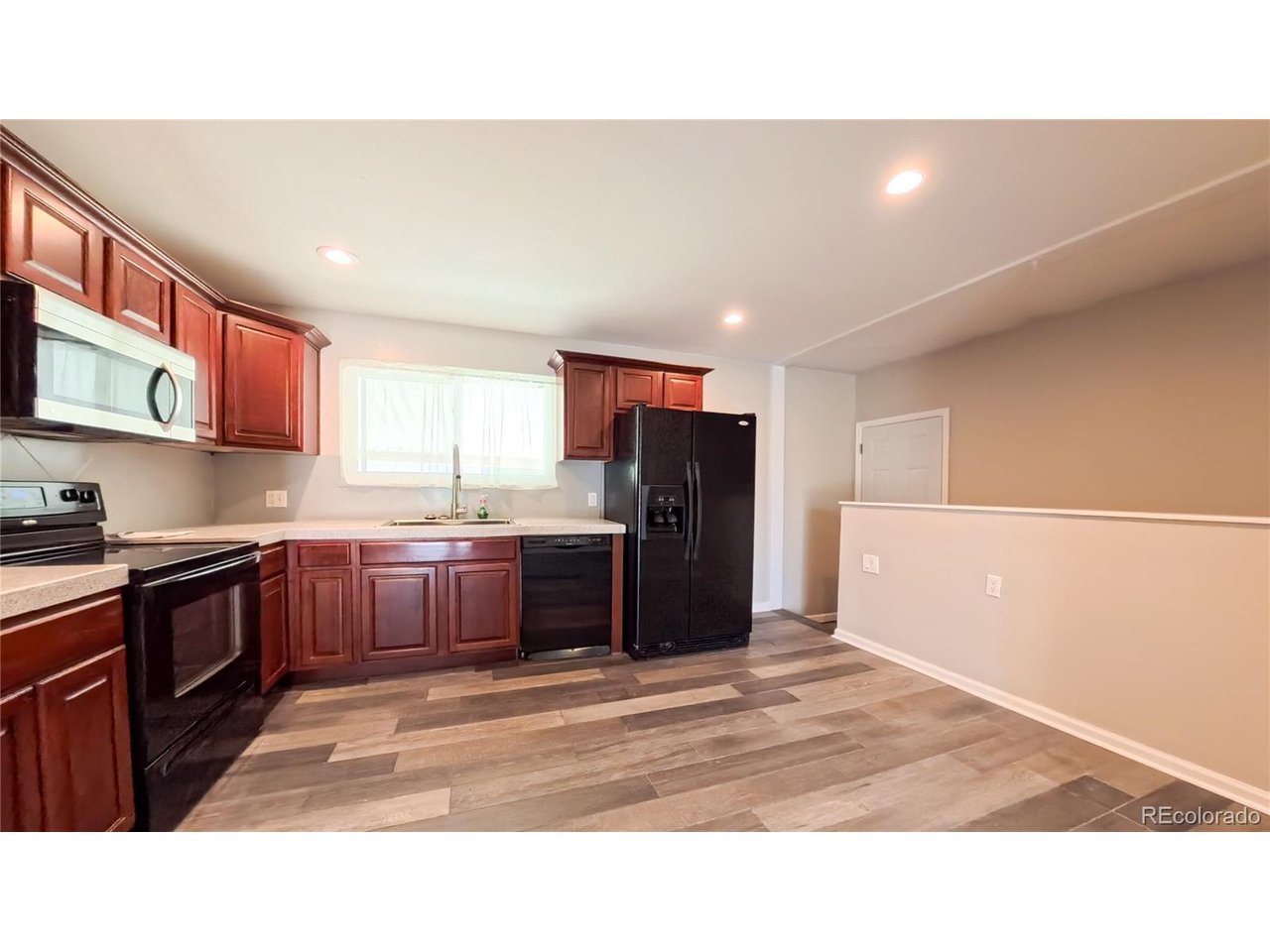 Welcome to this beautifully refreshed 4-bedroom, 2-bathroom home offering approximately 1,925 square feet of comfortable living space in one of Northglenn's most convenient and desirable neighborhoods. Thoughtfully updated and move-in ready, this home combines modern improvements with incredible potential for future expansion.The traditional floor plan features three bedrooms on the main level and a fourth bedroom in the finished basement with a conforming egress window, providing flexibility for guests, a home office, or multi-generational living. The finished basement has been refreshed with brand-new carpet, creating a comfortable and inviting additional living space. Throughout the home, the spacious living areas provide a warm and welcoming atmosphere for both everyday living and entertaining.Step outside to enjoy the expansive backyard featuring a covered patio-ideal for relaxing, outdoor dining, or hosting gatherings. The generous lot also offers ample space for a future two-car garage, workshop, or accessory dwelling unit (ADU), with buyers encouraged to verify zoning and municipal requirements.Enjoy peace of mind with several recent major updates, including a brand-new roof installed in March 2026 and a new hot water heater installed in late 2025, helping reduce future maintenance costs for years to come.Best of all, there is no HOA, giving you greater flexibility and freedom to make this property your own.Ideally situated near parks, schools, shopping, restaurants, and major commuter routes, this home offers the perfect combination of convenience, comfort, and future possibilities. With four bedrooms, two bathrooms, approximately 1,925 square feet of living space, a large backyard, numerous recent updates, and room for future expansion, this Northglenn home is ready to welcome its next owner.