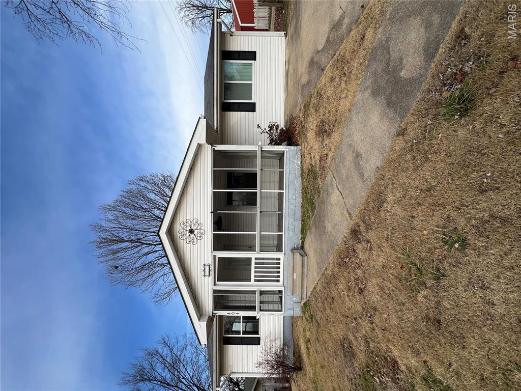 This charming 3 bedroom, 2 bathroom home is conveniently located near local public schools and features a welcoming screened-in front porch, perfect for relaxing and enjoying the outdoors. The seller is offering a $3,000 flooring allowance, giving buyers the opportunity to customize the space to their taste. The property also includes a small storage area for added convenience. With thoughtful features throughout, this home is ready for its next owner.