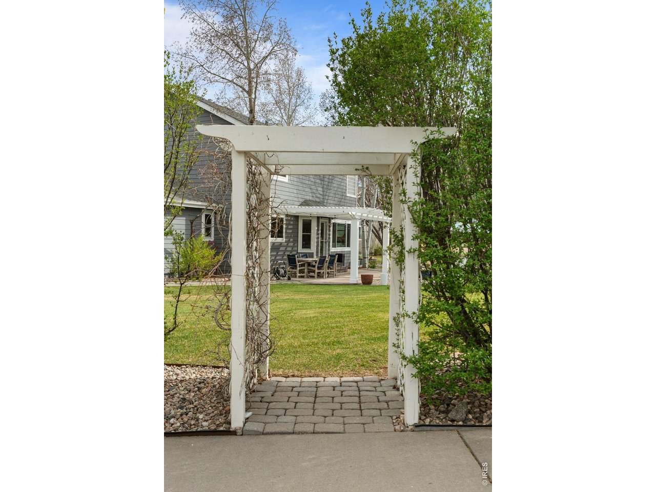 Welcome to this stunning 4-bed, 4-bath home plus 3-car garage nestled on a nearly 15,000 sq ft corner cul-de-sac lot in one of South Fort Collins' most sought-after neighborhoods! Mature trees and landscaping (full sprinkler & drip irrigation) provides a peaceful backyard retreat. Unwind on the pergola-covered patio with ambient low-volt landscape lighting. Inside, real hardwood floors flow through a thoughtfully designed main level featuring a dedicated office, formal dining room, and open living room with gas fireplace. The updated kitchen shines with granite countertops, 42" crown-molded solid wood cabinets, under-cabinet lighting, and black stainless appliances. Upstairs, the expansive owner's suite impresses with 10' ceilings, ceiling speakers, and a spa-like bath with white quartz tops and a soaker jetted tub. The fully finished basement adds a bedroom, 3/4 bath, and media/game room. Pride of ownership throughout - new exterior paint (2020), tankless Rinnai water heater, and recently replaced roof, windows, interior paint & appliances. 4' exterior fence permitted. This one won't last!