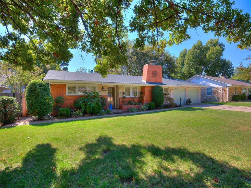Beautifully updated 3-bedroom, 2-bath home in one of OKC’s most sought-after neighborhoods,Wileman Belle Isle. This home has great curb appeal with stacked stone accents, mature landscaping and gorgeous shade trees. Inside, you’ll find wood floors and abundant natural light throughout. The spacious living room and cozy family room with fireplace provide plenty of space to relax and entertain. The family room flows easily into the dining area and updated kitchen, which features ample cabinetry, a storage pantry, stylish green tile backsplash and a coffee bar. 

The large primary suite offers a walk-in closet and full ensuite bath, while the secondary bedrooms are generously sized. The Pella windows have custom wood shutters in all rooms. Enjoy outdoor living on the patio overlooking the big, tree-filled backyard. Additional highlights include a laundry room with utility sink, newer roof (2023—insurance savings!), sprinkler system, and built-in garage storage.

Prime location close to The Oak, Penn Square Mall, and Nichols Hills dining and shopping.