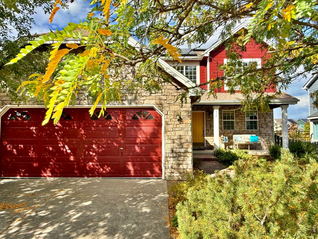 Welcome home to this beautifully updated, well-loved residence at 518 Arbor Dr, where thoughtful design meets exceptional energy efficiency. Large windows and fresh interior/exterior paint create a sunny and welcoming atmosphere from the moment you arrive at this turn-key property. The cozy porch surveys a xeriscaped frontyard oasis, including mature shade trees. The private backyard sanctuary features stunning custom flagstone paths, stone accent walls, a large and relaxing covered patio, and a raised garden overlooking quiet open space and views of Longs Peak. Upstairs, the expansive 400 sqft balcony deck is a grand space for enjoying your morning coffee or hosting an outdoor dinner party. Inside, the vaulted entryway immediately welcomes you into the wide-open living space, highlighted by a heartwarming fireplace, relaxing backyard views, and a natural-wood staircase. Seamless ambient music is possible via robust built-in speaker wiring throughout. The home features 4 bedrooms, 4 baths, and generous organized storage. High-performance, eco-friendly infrastructure protects you from fuel-cost uncertainty. The 4.5 kW rooftop solar array offsets nearly all home energy needs, paired with new, whisper-quiet whole-house heat pump for year-round comfort. Additional green features include a new heat-pump water heater and 240V Level-2 EV charging infrastructure in the garage. Perfectly situated for effortless access to Boulder, Longmont, Broomfield, and the I-25 corridor. A short walk easily leads to Lafayette's Public Library, open-space trails, the Lafayette Rec Center, VASA Fitness, and Old Town Lafayette local coffee shops, craft breweries, and dining. Enjoy vibrant community events like the Sunday Farmers Market, Art Night Out, and the Picnic on the Plaza live-music series. This is a super safe, walking neighborhood with no thru traffic. Come visit today and make this cozy, future-proof haven your own!