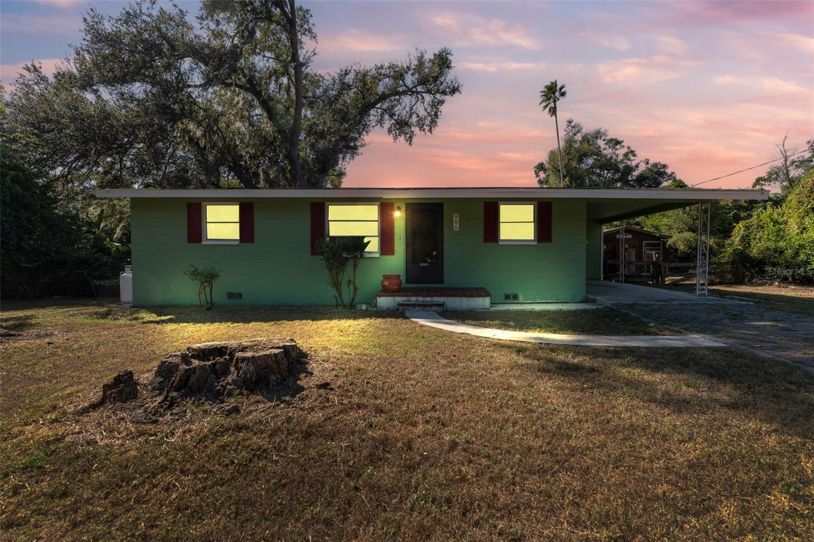 Prime location, prime opportunity! Don’t miss your chance to own this hidden gem. This home features 3 bedrooms and 1.5 bathrooms, along with an attached covered carport. If you're someone who enjoys DIY projects or needs a space for their hobbies, the large workshop is sure to impress. It offers plenty of storage space for tools and equipment, as well as ample workspace to complete your projects. Outside, you'll find a large lot with a meticulously maintained yard. The outdoor space is perfect for hosting barbecues and simply enjoying the beautiful Florida weather. This property is located in a peaceful and quiet neighborhood, yet still close to all the amenities you need. Don't miss your chance to make this house your forever home!