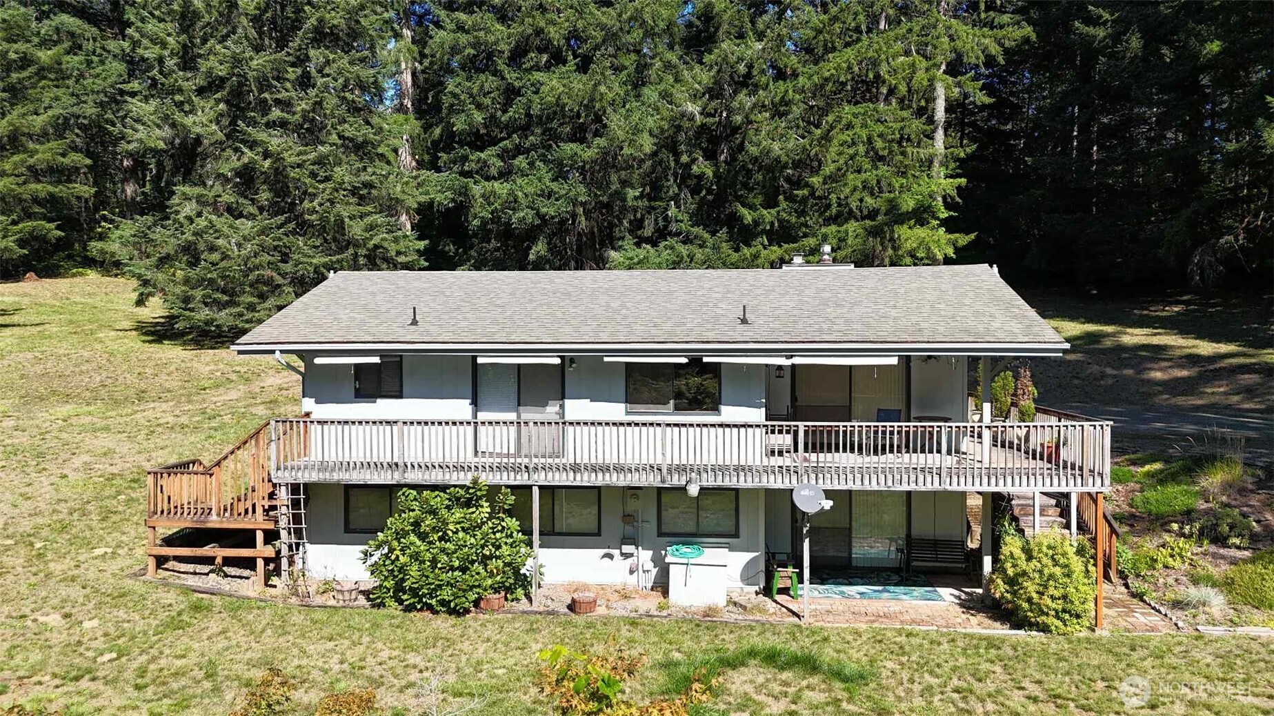 First time on market, this is a beautiful home with ample room, 4 bedrooms & 2 living room spaces. Nicely treed parcel with seclusion and still close in. Nice 2 car garage with breezeway, large yard, deck and lower patio. The shop/barn could easily house a horse or two, goats or make a mechanic shop. The options are endless here, come take a look today!