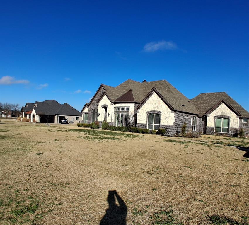 Stunning home in beautiful High Point Lake Estates.  Private 1.5 acres lot. Fun neighborhood with activities, celebrations, a park, lakes and walking trails. One story with stained concrete floors.  Primary suite features a vaulted marble surround shower with two showerheads, dual vanities & closets, jetted spa tub. Dedicated study with French doors. Formal dining room with rounded bay windows. Bright breakfast nook overlooking the pool. The kitchen features marble countertops, double ovens, a pot filler, walk-in pantry, glass cabinets, cabinet lighting and a wine refrigerator. Oversized laundry with 2nd pantry. Wrought iron fence, exterior ambient lighting, sprinkler system, gas connector. Luxury heated pool with water features and hot tub.