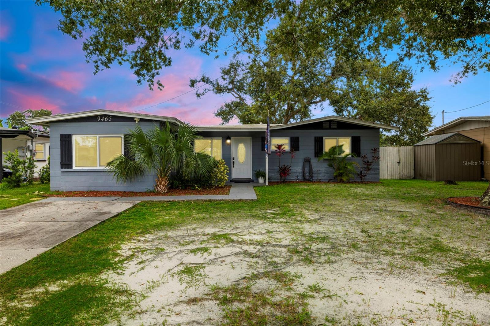 CLICK the LINK to see our video: https://listings.firelightimages.com/sites/rxeloqa/unbranded Welcome to 9465 50th Way N in Pinellas Park, where modern updates meet peaceful lakefront living. This 4-bedroom, 2-bathroom home has been thoughtfully improved over the past few years, giving you a worry-free lifestyle with all the big-ticket items already taken care of. A BRAND NEW roof was installed in 2022, new A/C system in 2024, new hurricane-rated windows, new attic insulation just completed in 2025, and a full set of 2022 appliances, bringing both comfort and efficiency to your everyday living. Inside, the home offers a bright and functional layout with flexible space for any lifestyle. The back of the house features a unique connected suite: one room with a standard closet opens to another with a walk-in closet, creating the perfect retreat for a primary suite or a combination bedroom and home office. The additional bedrooms and bathrooms are equally inviting, giving everyone their own space while keeping the flow of the home connected. What truly sets this property apart is its outdoor living. Step onto the large elevated back porch and take in the expansive view of the sparkling lake, whether you’re enjoying your morning coffee, hosting weekend barbecues, or simply relaxing at the end of the day, it’s a space designed for making memories. The fenced backyard stretches all the way to the water’s edge, offering both privacy and plenty of room for pets, gardening, or outdoor play, all framed by the tranquility of the lake. Located in a convenient Pinellas Park neighborhood, you’ll be just minutes from shopping, dining, parks, and major highways, with quick access to downtown St. Petersburg and the Gulf beaches. This home combines the peace of waterfront living with the practicality of modern updates, making it move-in ready and easy to love. Don’t miss the opportunity to call this one yours, schedule your private showing today!