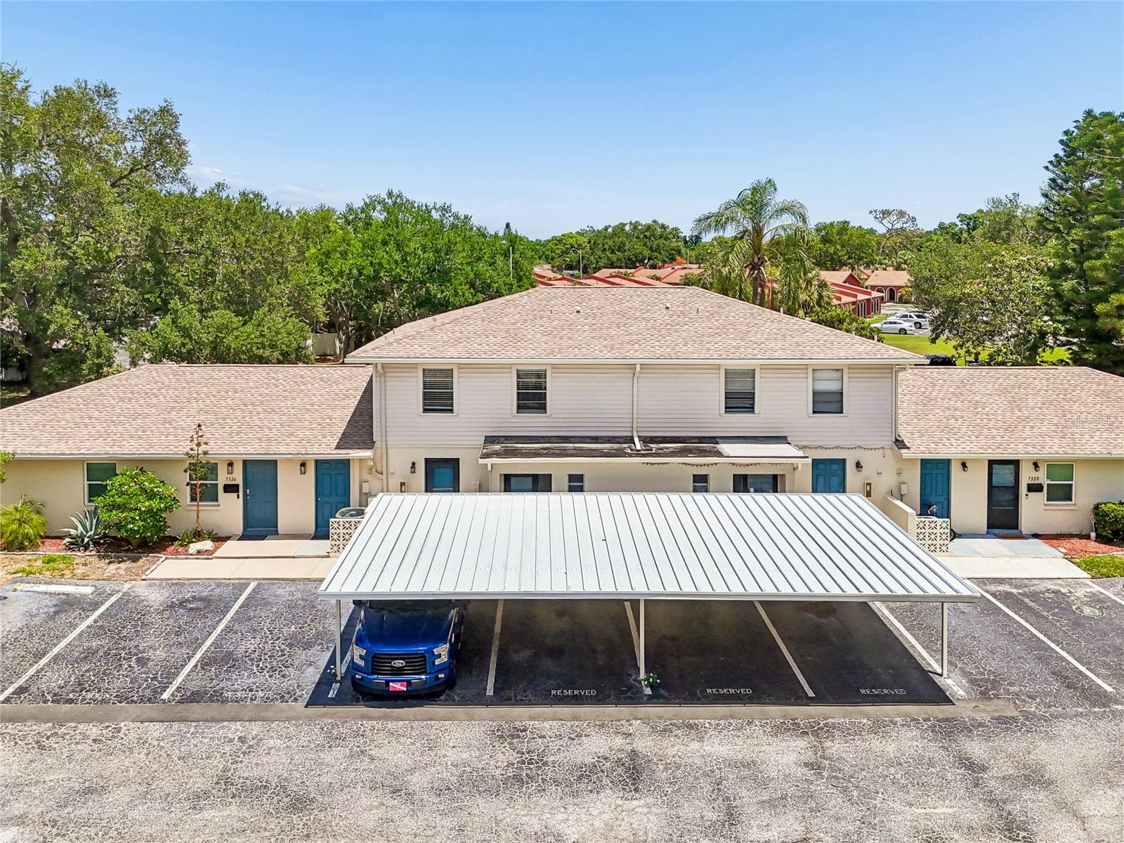 This 3 bedroom townhome is a unique find, tastefully remodeled and hosts an open concept main floorplan. The kitchen is fantastic with tons of storage with white cabinetry, granite countertops, a spacious island, and stainless steel appliances. Enjoy LVP flooring downstairs for pet friendly and very easy cleaning. Two sets of sliding doors lead out to the fenced-in patio for privacy and enjoyment of your outdoor space. Upstairs you will find the primary bedroom includes dual closets and an ensuite bath with walk-in shower. There are also 2 additional bedrooms, a main bath, and balconies to enjoy the outdoors from upstairs. This home is being sold Partially Furnished. Last is an inside laundry room that includes the washer & dryer plus has added storage. The HOA fee includes Cable TV, water, sewer, and trash plus exterior maintenance for peace of mind for years to come. Great location just off 62nd Ave you are in the center of everything, plenty of shopping and dining are nearby and only 15 minutes to Madeira Beach for fun in the sun! Call today for a private tour.