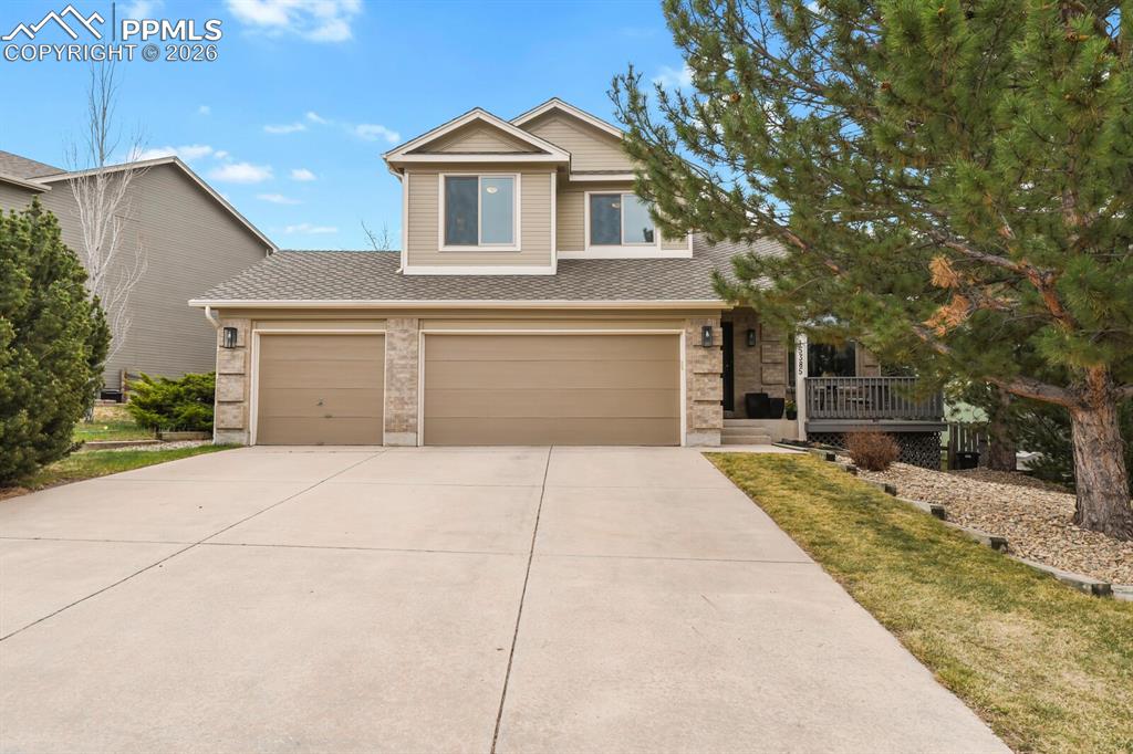You’re stepping into a home that shows like a model and has been meticulously cared for with the same level of pride and attention to detail.This beautifully maintained 4-bedroom, 4-bath home in the desirable Gleneagle area and highly sought-after District 20 offers comfort, style, and thoughtful upgrades throughout. Step inside to find fresh new carpet and paint, along with new light fixtures and updated flooring in various rooms, creating a clean, modern, move-in-ready feel—further enhanced by the fact that no animals have occupied the home.The spacious layout includes a formal living room for elegant entertaining and a warm, inviting family room highlighted by a stunning gas fireplace—perfect for cozy evenings. The home also features a versatile lower-level family room or bonus space, ideal for a media room, playroom, or home office.An abundance of windows fills the home with natural light, creating a bright and welcoming atmosphere in every room. The kitchen is equipped with newer stainless steel appliances, making it both functional and stylish for everyday living and hosting.Outside, enjoy a welcoming front porch and a professionally landscaped backyard designed for relaxation. The oversized back deck is perfect for entertaining, complete with a mechanical solar shade over the sitting area for added comfort on sunny days.Car enthusiasts and those needing extra storage will appreciate the immaculate oversized 3-car garage. This home truly combines functionality, beauty, and pride of ownership in a prime location.