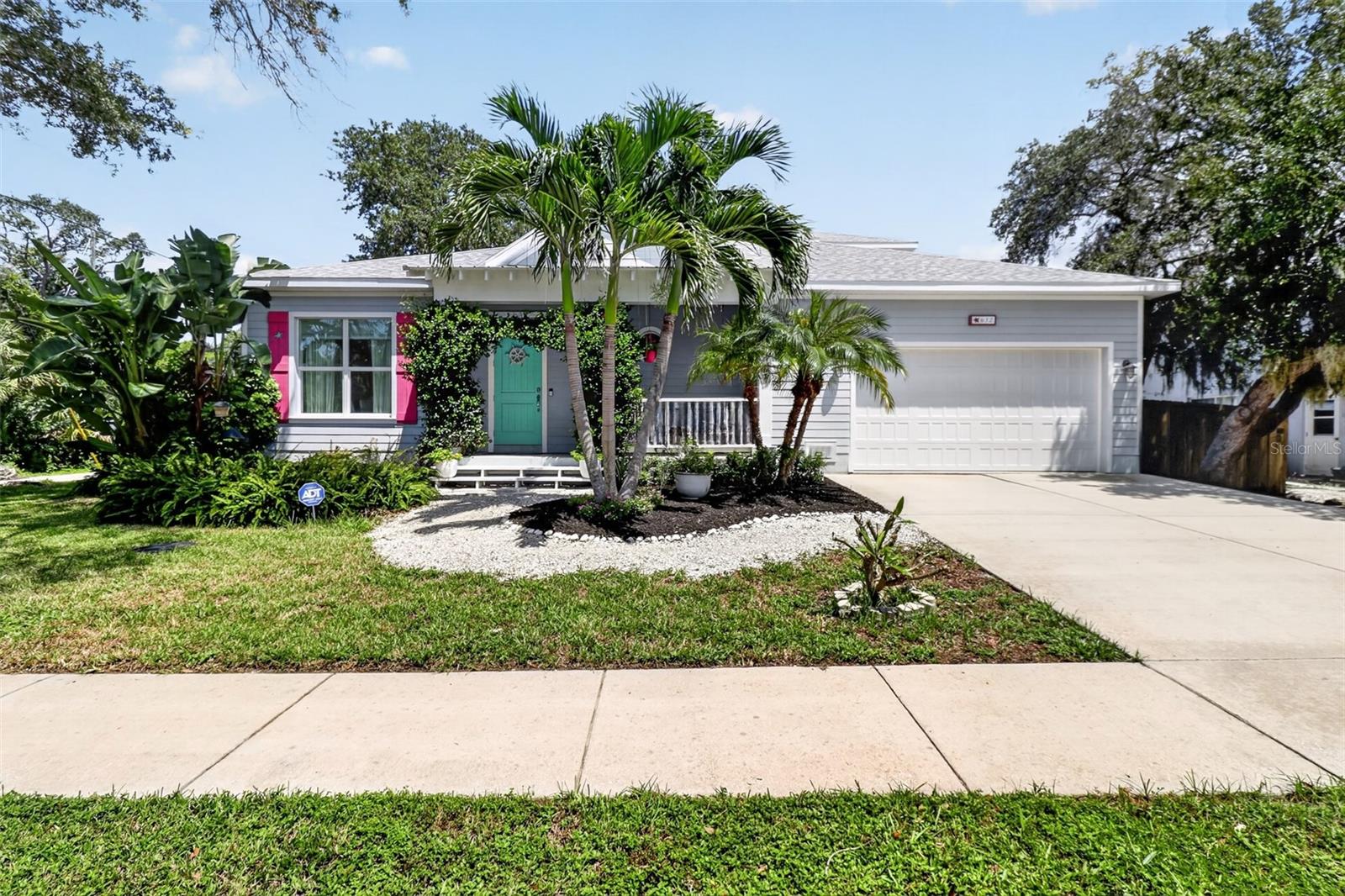 A RARE OPPORTUNITY TO LIVE ALONGSIDE FRED HOWARD PARK AND WALK TO THE BEACH! Privacy, space, and the Florida lifestyle come together in this distinctive 3-bedroom, 2.5-bath pool home offering 3,066 square feet of total living space on a desirable corner lot. Bordering beautiful Fred Howard Park, the property features private access to the park, putting miles of scenic trails and the beach within walking or biking distance from your own backyard.Inside, an abundance of windows fills the home with natural light, while porcelain tile flooring creates a clean, cohesive look throughout. The thoughtfully designed two-story floor plan places the spacious primary suite on the ground floor, complete with a beautifully appointed bath, dual vanities, freestanding soaking tub, and an impressive custom walk-in closet. Two additional bedrooms are located upstairs, providing privacy and separation for family or guests.At the heart of the home is a chef-inspired kitchen designed for those who truly love to cook and entertain. Features include a propane gas range with dedicated exhaust vent, wine refrigerator, touchless faucet, quartz countertops, subway tile backsplash, and exceptional cabinetry and storage for cookware, appliances, and entertaining essentials.Step outside and discover your own private Florida retreat. The backyard features a swimming pool surrounded by lush tropical landscaping, an outdoor grilling area with refrigerator, and raised garden beds perfect for growing fresh herbs, vegetables, and seasonal produce. Mature landscaping enhances the sense of privacy while the neighboring park provides a remarkable natural backdrop.The oversized two-car garage offers considerably more than parking, with ample additional space for a home gym, workshop, hobby area, or extra storage. Additional improvements include a new air handler installed in June 2026, electric car charging station, water heater replaced in 2022, and rain-leaf gutter system.Few homes combine this much interior space with a private pool, oversized garage, corner-lot setting, direct access to Fred Howard Park, and the ability to walk or bike to the Gulf. Whether spending the afternoon by the pool, tending the garden, biking through the park, or heading to the beach for sunset, this is a home designed around the best of the Tarpon Springs lifestyle. LISTING AGENT IS SELLER.