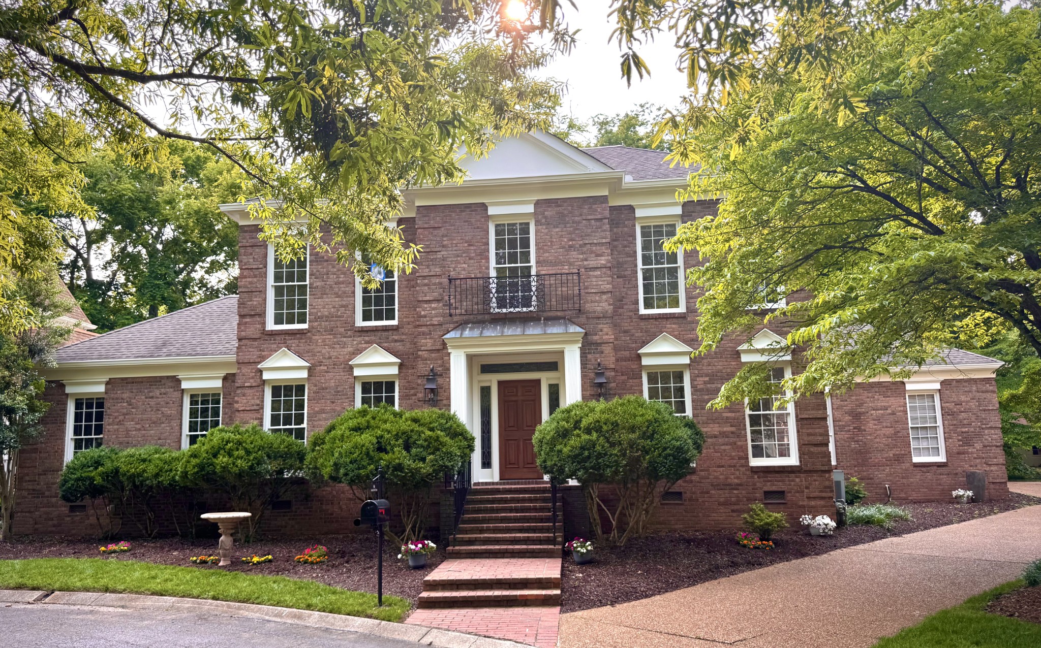 Nature, Elegance, and Everyday Ease—All Within a Timeless Gated Community. Just minutes from St. Thomas, Vanderbilt, Belle Meade Village, and Green Hills mall, this traditional two-level Colonial Revival in desirable Sugartree offers serenity, privacy, security and proximity. Backed by Belle Meade within a vast nature area, it feels like a private park—perfect for peaceful strolls and bike rides. Sugartree, a registered arboretum, is known for its mature trees, private streets, and enduring charm and provides amenities including tennis/pickle-ball, a playground, and a heated pool. The house has a freshly painted exterior with Alabaster interior to create a light, calming atmosphere. The downstairs master has dual expansive closets, heated floors, jacuzzi tub, and travertine vanities. Upstairs includes Jack & Jill bedrooms, and a second master with dual closets and his/her vanity. A guest suite over the garage includes a full bath and large closet. Move-in ready or ideal for value adds.