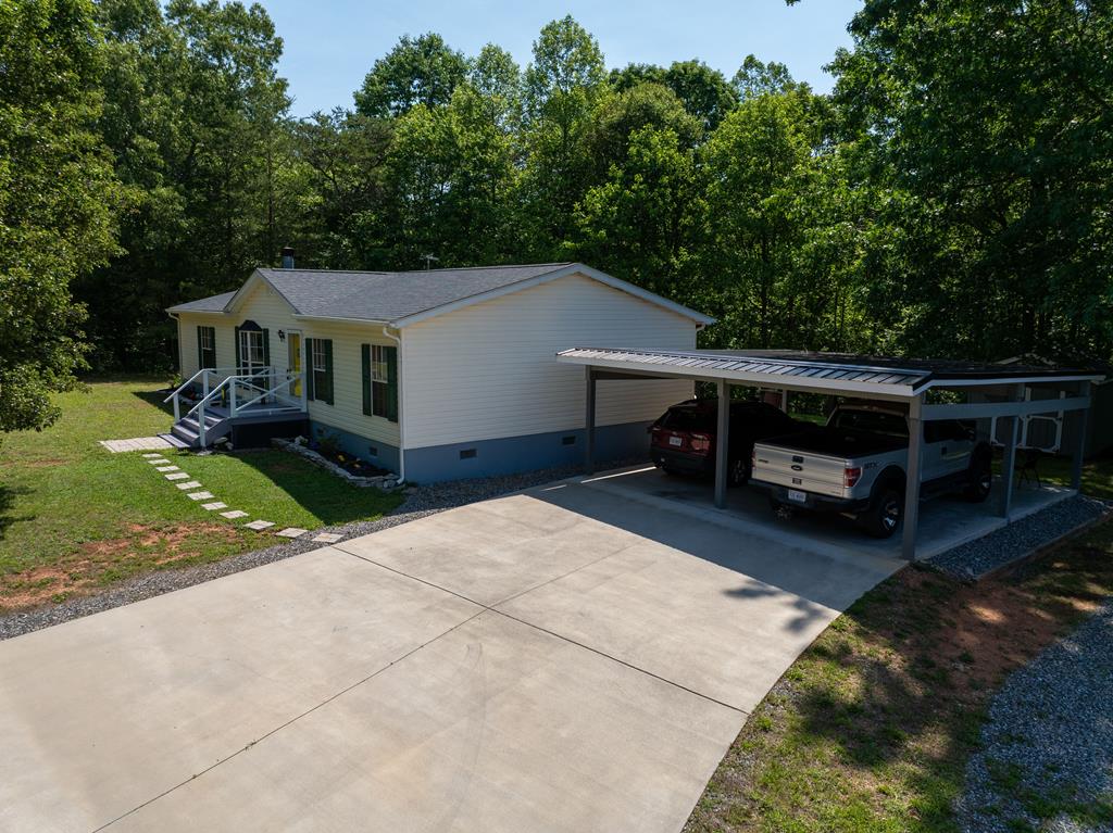 Well maintained 3 bd, 2 ba Ranch Modular on quiet dead end street.   Living room has stone face wood burning fireplace. Dining room leads out to a beautiful newer screened in porch overlooking yard and woods.  New appliances in the kitchen with a skylight.  The 12 X 16 shed has electricity including hookup for RV.  Owner has systems serviced regularly and the home is extremely well maintained.  There is no sign in front so follow the printed directions of use GPS.  Please provide at least an hour notice for showings.