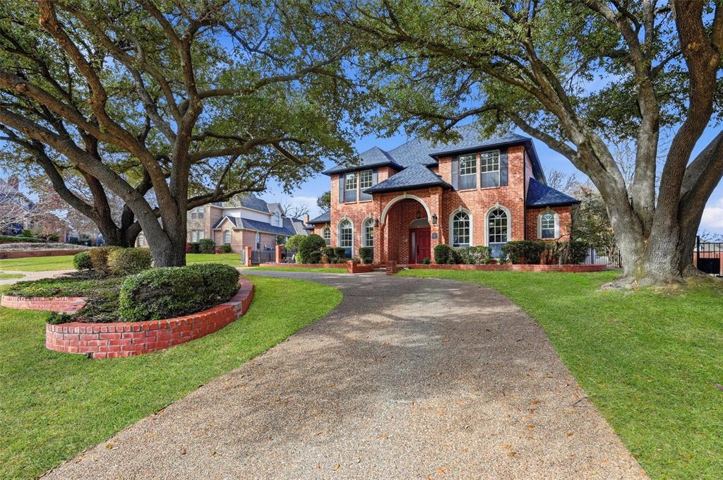 This stately residence offers an exceptional blend of elegance, comfort, and modern design, featuring 4 bedrooms, 4 bathrooms, 3 living areas, a private office, and an impressive outdoor retreat. Situated on nearly half an acre in the highly sought-after Highland Meadows, the home is framed by mature trees and commands striking curb appeal.Recent renovations include a new roof, an upgraded HVAC system for the main level, and extensive cosmetic updates throughout. The expansive living spaces are open, bright, and thoughtfully designed, highlighted by a dramatic floor-to-ceiling fireplace, designer lighting, and sweeping views of the sparkling backyard pool.The gourmet kitchen is ideal for both everyday living and entertaining, showcasing stainless steel appliances, quartz countertops, custom illuminated cabinetry, and generous workspace. The main level features the primary living areas, a private office, and the luxurious primary suite.The primary retreat overlooks the backyard and offers a spa-inspired bathroom complete with an oversized walk-in shower, freestanding soaking tub with chandelier, and an expansive walk-in closet.Upstairs, the home is thoughtfully divided for privacy and flexibility. One wing features a versatile second living area, while the opposite wing offers a secondary primary suite, a third living space, and two additional bedrooms connected by a spacious Jack-and-Jill bathroom. All upper-level rooms include built-in desks and abundant storage.Outdoors, enjoy a private, fenced backyard oasis with a heated pool and spa, along with ample space for recreation, entertaining, and relaxation.Ideally located just minutes from premier shopping, dining, and entertainment destinations such as Town Center Colleyville and Southlake Town Square, this exceptional property delivers refined living in a coveted setting. This is luxury living at its finest.