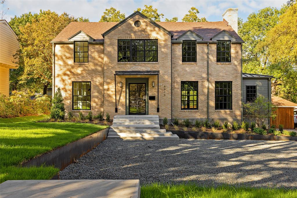 Come experience this fully renovated Colonial Revival Style home that offers a rare blend of historic charm and modern comfort, all set on a sprawling 70x200' lot in the heart of Lakewood. The lot is HUGE! With nearly 2,300 square feet of thoughtfully designed living space, this two-story home features a traditional layout with the kitchen, living, dining, and study on the main floor, and all bedrooms upstairs — including a spacious primary suite nestled among the treetops for a serene retreat. No detail has been overlooked in this high-end renovation. Updates include: Full house electrical rewire, All new plumbing and new gas line to alley, Brand new HVAC system, New windows throughout, Oversized steel front door, Custom steel awnings at front and rear porches, New roof with metal accents and new gutters, All-new concrete walkways and front motorcourt with steel retaining wall, New perimeter fencing, New Rear Deck, The oversized lot offers not just space, but opportunity — whether it’s entertaining, expanding, or simply enjoying room to breathe. Seller has architectural plans on hand for a future addition, offering even more potential.