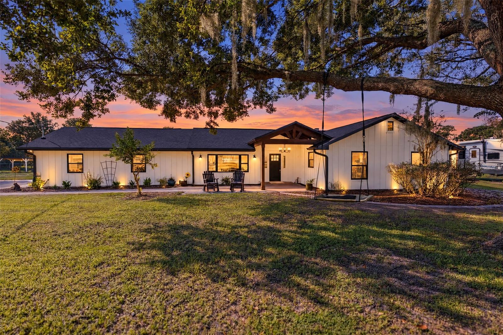 Virtually Staged. Welcome to an exceptional five-acre equestrian property in Lake Pickett Estates, where privacy, space, and a true outdoor lifestyle come together. This beautifully updated 3-bedroom, 2-bath home offers approximately 1,977 square feet and expansive pasture views from an abundance of windows throughout the home.Recent improvements include a 2025 roof, re-piping, newer front windows, Hardie board-and-batten siding, wide-plank LVP flooring, updated bathrooms and laundry, and a beautifully remodeled kitchen featuring elegant dolomite countertops. Enjoy your morning coffee from the front porch or unwind on the back porch while taking in the peaceful acreage.The fully fenced property is designed for enjoying the lifestyle—bring your horses, toys, and outdoor pursuits. The three-stall barn includes an air-conditioned tack room/enclosed office, offering flexible space for an office, studio, gym, hobby room, or other uses. A chicken coop, private pool and spa, and ample room for animals, gardening, recreation, and entertaining add to the appeal.Horse enthusiasts will appreciate miles of nearby riding trails, while boaters and anglers can enjoy convenient deeded access to beautiful Lake Pickett, complete with a dock, beach, and boat launch. The friendly HOA is just $525 per year.Five acres. Equestrian lifestyle. Lake access. Updated home. Barn. Pool. Privacy. A rare opportunity to enjoy room to breathe, room to roam, and the freedom to live life your way.  Recent improvements include: New PEX plumbing throughout the home, new exterior doors, new windows throughout the home, except for  back porch, new submersible well pump and piping, new Hardie Board exterior siding, new roof installed in 2025, pool pump replaced approximately two years ago, new Kinetico water filtration system installed in 2020.