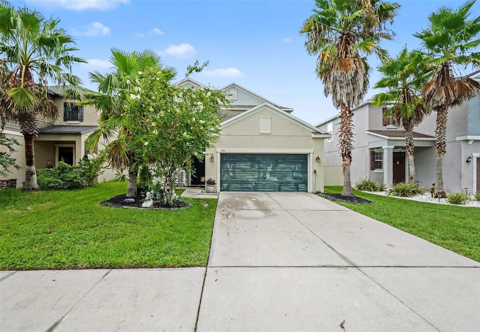 MOTIVATED SELLER - Welcome to 1561 Tallulah Terrace, a beautifully designed two-story home offering over 2,470 square feet of thoughtfully planned living space in one of Wesley Chapel's most desirable communities. This spacious 5-bedroom, 3.5-bath residence features an open-concept floor plan filled with natural light, creating the perfect setting for both everyday living and entertaining.The well-appointed kitchen overlooks the main living and dining areas, providing an ideal gathering space for family and guests. A generous primary suite offers a private retreat with an en-suite bath and ample closet space, while additional bedrooms provide flexibility for family, guests, or a home office.Step outside to enjoy a private backyard with room to relax, play, or create your own outdoor oasis. Conveniently located near top-rated schools, shopping, dining, parks, and major commuter routes, this home combines comfort, style, and everyday convenience in the heart of Wesley Chapel.Don't miss this opportunity to own a spacious, move-in-ready home in a thriving location close to everything Tampa Bay has to offer.