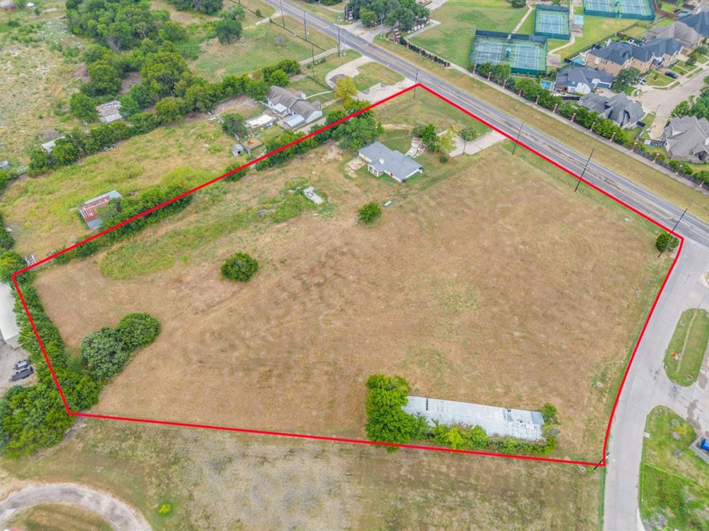 4.80 Acres on this Busy Corner Location with 2 Lots Combined. This is an Amazing Location for a Medical Practice, Dental, Retail Strip, Restaurant or any business. Being Sold For Land Value. Buy one (2.308) tract or both (2.491) to include 4.80 Acres. Demo the 2115 SF building or remodel. The corner lot includes a green barn at 2832 SF at the back. Close to Presbyterian Hospital, Pullen & Cain School and across from Buffalo Creek Subdivision and Golf Course. Quick access to Hwy 30 & HWY 205. Buyer and Buyer's agent to verify all info. There are 2 parcels at this address & Ranch Trail. 
Mls# 20948088 and 20948158.
