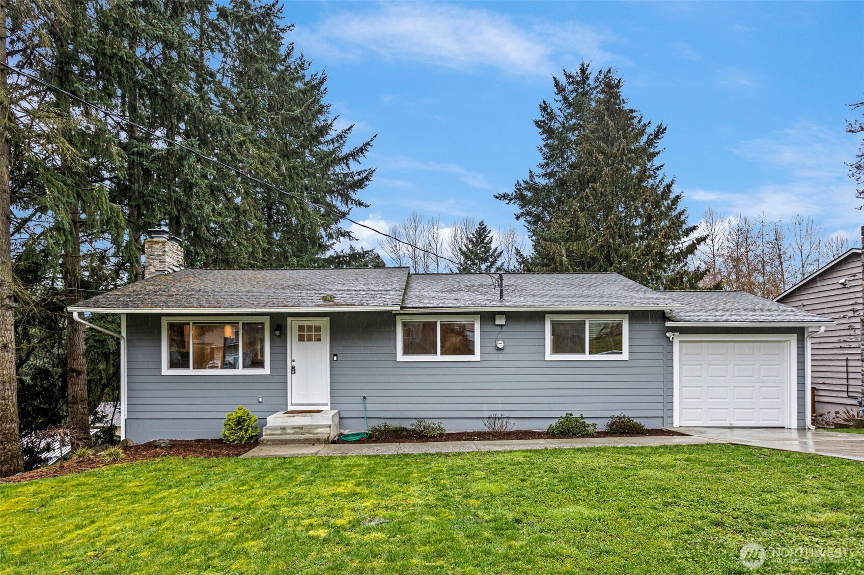 MOTIVATED SELLER! Recently renovated -- this beautiful daylight rambler impresses with refined modern finishes throughout. Main floor includes 3 bedrooms and a modern kitchen, opening to a large back deck which overlooks the oversized backyard - perfect for entertaining or peaceful evenings at home. Downstairs you'll find a large primary bedroom, separate entertainment space. Combined with the added flex bonus room, the lower level feels like its own separate wing, easily converting into a MIL suite for rental or multigenerational living. Nestled in the Issaquah School District, this home delivers the best of a turnkey remodel — without the time, cost, or compromise. And don't forget about the dedicated RV/boat parking which adds a practical bonus rarely found at this price point.  Don't miss an amazing opportunity!
