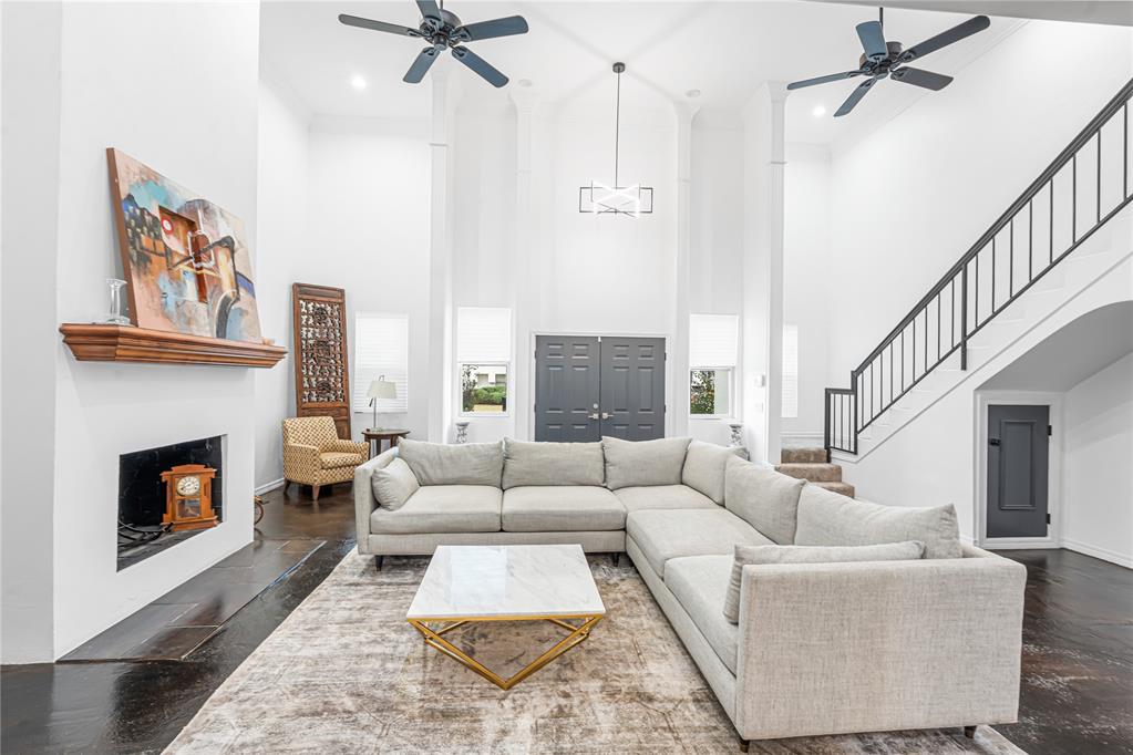 ALMOST 3,000 SQUARE FEET! This Condo boasts a rare Double Primary Suite layout (one on each floor!), an added bedroom or office, a formal dining, and a list of upgrades that you can't resist. This high-end space has been meticulously reimagined from the slab up, offering the square footage of a suburban estate with the low-maintenance condo lifestyle you crave. The seller has maximized every inch by enclosing the former atrium to create a massive 2,887 sq ft footprint, adding a stunning formal dining room and a third bedroom or office upstairs. The main-floor primary suite is equipped with a 7-speaker surround sound system, 2 walk-in closets, and a private bathroom. The second-floor primary suite offers privacy, bonus square footage for a lounging area, and a stunning bathroom that has a shower and soaking tub. The living area offers a wood-burning fireplace, upgraded light fixtures, and 2-story ceilings. No detail was spared: All-new PEX plumbing, new electrical, a brand-new EPDM roof, new paint, new light fixtures, and soundproof sheetrock for total serenity. The completely remodeled kitchen features custom Copper Countertops and Wi-Fi-enabled appliances to add luxury and convenience to your daily living. Don't miss out on this opportunity to make this spacious and upgraded yours!   Note: The neighboring end-unit (2917) is currently in probate. Plans have been drawn and are available upon request, offering a unique opportunity to build-to-suit and customize to your needs.