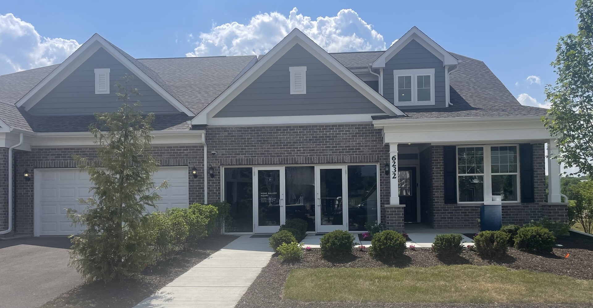 Welcome home to Rivers Edge! Ranch Duplexes in walking distance to Main Street and Seven Bridges. The Provence ranch duplex offers an open concept with an integrated kitchen, cafe and gathering room. This Provence includes the optional 2nd floor loft, bedroom and bathroom and the full unfinished 9' basement with bath plumbing rough-in. The beautiful Provence welcomes you into the great room, cafe and kitchen area, a great space for family and friends to gather. You have a bright airy year-round sunroom off the great room that expands your living area. Your gourmet kitchen includes upgraded cabinets and built-in SS appliances. Your large island has room for seating, and you have a pantry for extra storage. The dining area features a beautiful bay window. Your spacious owner's suite is tucked away for your complete privacy and has a large walk-in closet, and the primary bathroom has a double bowl vanity with Quartz counters and a separate shower with glass doors. The laundry room includes cabinets and a utility sink. Homesite 26001. Lots of upgrades -like wrought iron rail and spindle stairway - you will appreciate in this gorgeous Provence! Photos of similar home show some options not available at this price.