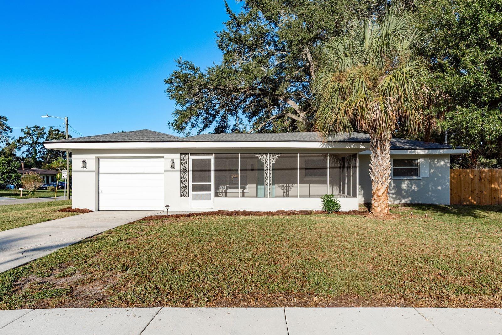Welcome to this beautifully updated 3-bedroom, 1.5-bathroom home located in the Pine Brook Highlands neighborhood of Clearwater! Featuring 1,193 sq. ft. of living space, this single-story block home offers a functional open floor plan with a spacious living and dining room. The kitchen is outfitted with  appliances (2025) including a refrigerator, range, and dishwasher. Recent upgrades provide peace of mind, with a roof (2025), HVAC (2025), flooring (2025), and fencing (2025). The primary bedroom includes a built-in closet, while two additional bedrooms offer flexibility for family, guests, or a home office.
Set on a large corner lot, the property boasts plenty of outdoor space and a fully fenced backyard, perfect for entertaining or pets. Additional highlights include a one-car garage and location in Flood Zone X.
Just minutes from shopping, dining, schools, and world-famous Clearwater Beach, this move-in ready home is ideal for first-time buyers, downsizers, or anyone seeking comfort and convenience in a prime location.