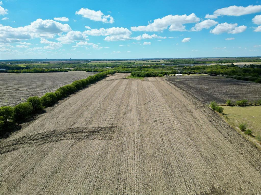 Almost 30 Acres in a prime location for future Growth and Development property. This is one of the fastest growing areas in Collin County. Future proposed 6 lane road in Front of Property, Collin County Outer Loop about half a mile north of location and The Proposed Fm 1461 to be 6 lanes. Aster Park with 1,163 lots is already in the development stage with homes standing. Proposed 400 Acres of Goodman Ranch East of Cr165 with another Proposed 10,000 Lots of Honey Creek to the east. Home on Property is rental and 2114 square foot Brick, built in 1978 per Central appraisal district.Value in the LAND !!!