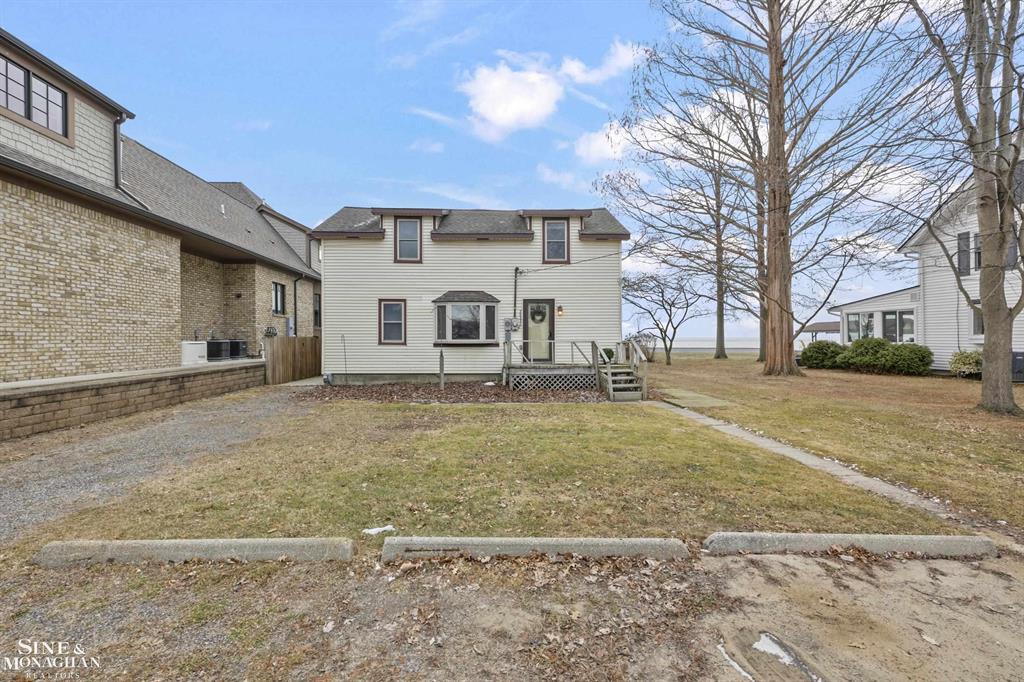 Rare opportunity to own a prime waterfront property on beautiful Lake St. Clair in sought-after Harrison Township! This exceptional lot offers endless potential for the next owner. The existing home provides a solid starting point for renovation, or take advantage of the incredible opportunity to design and build your dream lakefront residence.  Significant improvements have already been completed, including a brand-new seawall, a new removable dock system (easily stored for winter), and a boat hoist, making this property ready to enjoy lake living right away. Positioned along one of the most desirable stretches of Lake St. Clair, this location is known for its stunning water views, boating lifestyle, and easy access to the lake's open waters. Whether you renovate the existing home or build new, this is a rare chance to secure a premium waterfront setting with tremendous upside potential. Bring your vision and make the most of this incredible lakefront opportunity!