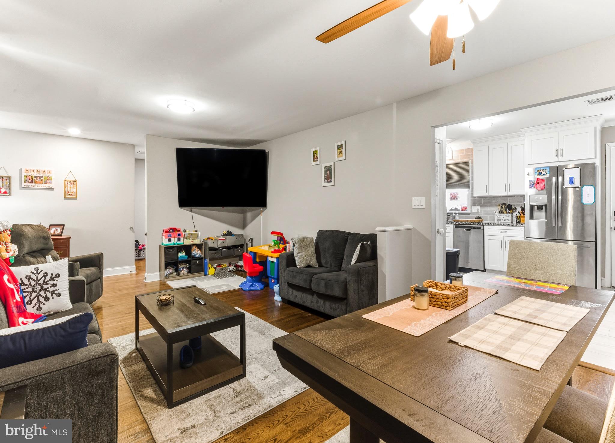 This spacious rancher offers four bedrooms and three full bathrooms, including a private in-law suite with  bedroom, full bath, living room and kitchen. The main house has been beautifully updated with a modern kitchen featuring white shaker cabinetry with crown molding, stainless steel appliances including gas cooking, a new faucet, tile flooring, and recessed lighting. The open living and dining area boasts hardwood floors, a ceiling fan with overhead lighting, creating a warm and inviting space.All three bedrooms in the main home have hardwood flooring, full closets, and overhead lighting. The hallway bathroom includes a tub/shower combo with a stylish subway tile surround, an updated vanity, and a linen closet. The fully finished basement adds extra living space with luxury vinyl plank (LVP) flooring, a cedar closet, replacement windows, and ample room for various uses including storage. The in-law suite is fully equipped with a kitchen featuring white shaker cabinetry, electric cooking, recessed lighting, a ceiling fan, and a mini-split system for heating and cooling. Its bathroom has been updated to include a walk-in shower with a fully tiled floor and surround.Additional upgrades include a new 240-amp electric panel, a radon mitigation system, a roof just three years old, and a new HVAC system. Situated on a half-acre lot, this sprawling rancher is conveniently located close to restaurants, shopping, and all major highways, making it an ideal home for comfortable living and entertaining.  Don't delay, call me today to schedule your private tour!