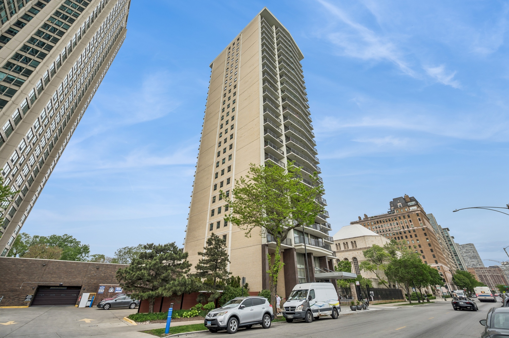 Spectacular one-of-a-kind condo spanning 3/4 of a full floor in this boutique East Lakeview high-rise. The unique layout combines two corner units, resulting in 2,850 square feet of beautifully updated living space with 4 private balconies and sweeping views of Belmont Harbor. Enjoy hardwood floors throughout, corner windows, a sunken living room, and separate dining area. The stunning kitchen has stainless appliances and sleek finishes. A large primary suite includes its own balcony and spa-like bath with double sinks and separate shower. Both generously sized second and third bedrooms also feature private balconies. A rare high rise feature is the huge custom in-unit laundry room. Located in a well-maintained elevator building with only three residences per floor, this home allows up to two valet parking spaces in the attached heated garage. Building amenities include a rooftop pool, sundeck and fitness center. Prime walk-to-everything location close to the Lake, parks, dining, shopping, and transit. Cats allowed; dogs only with ESA or service documentation. This is a home you won't want to miss!